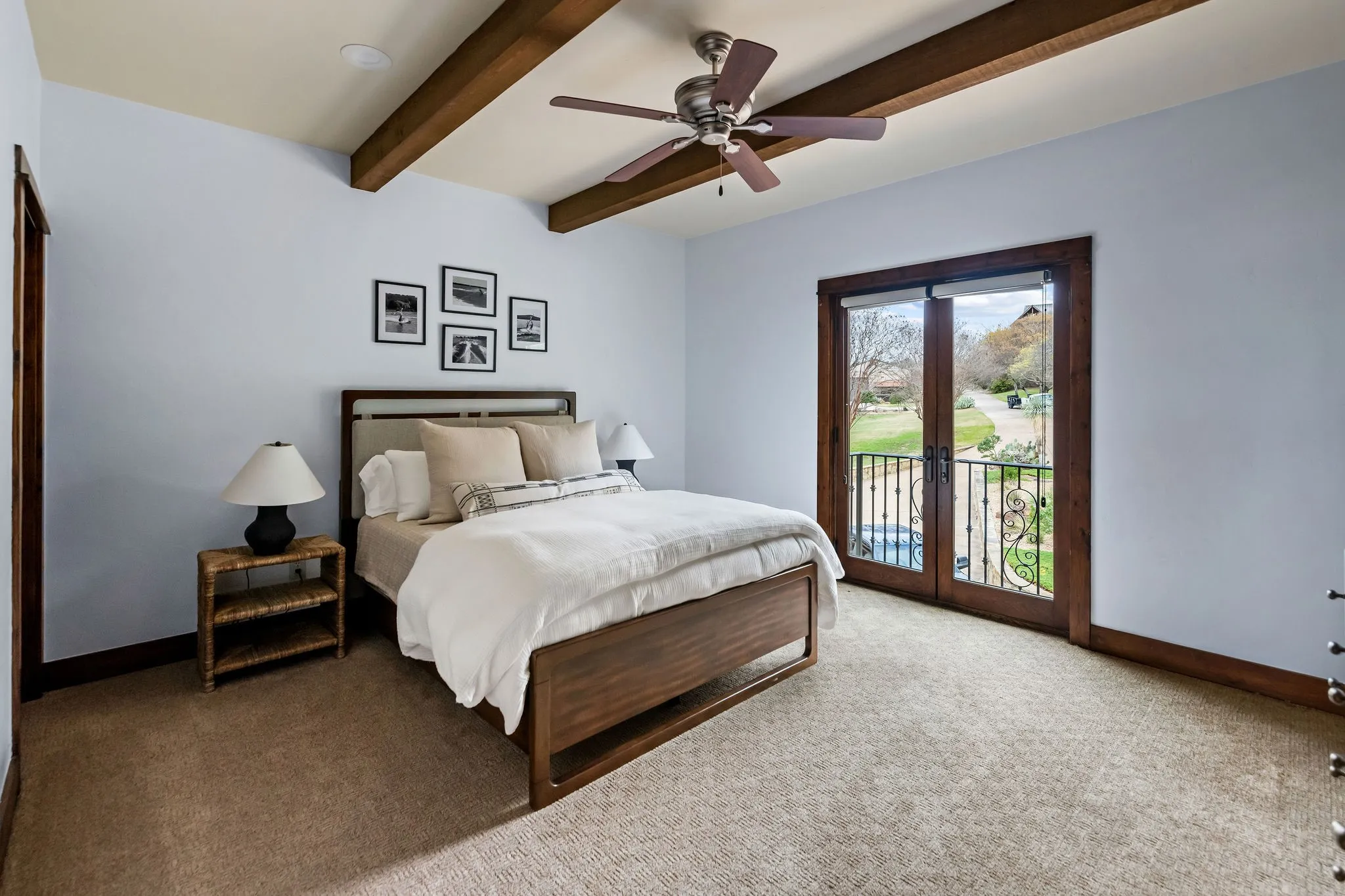 This upstairs bedroom with en suite in the main residence has two doors overlooking the front of the main house!