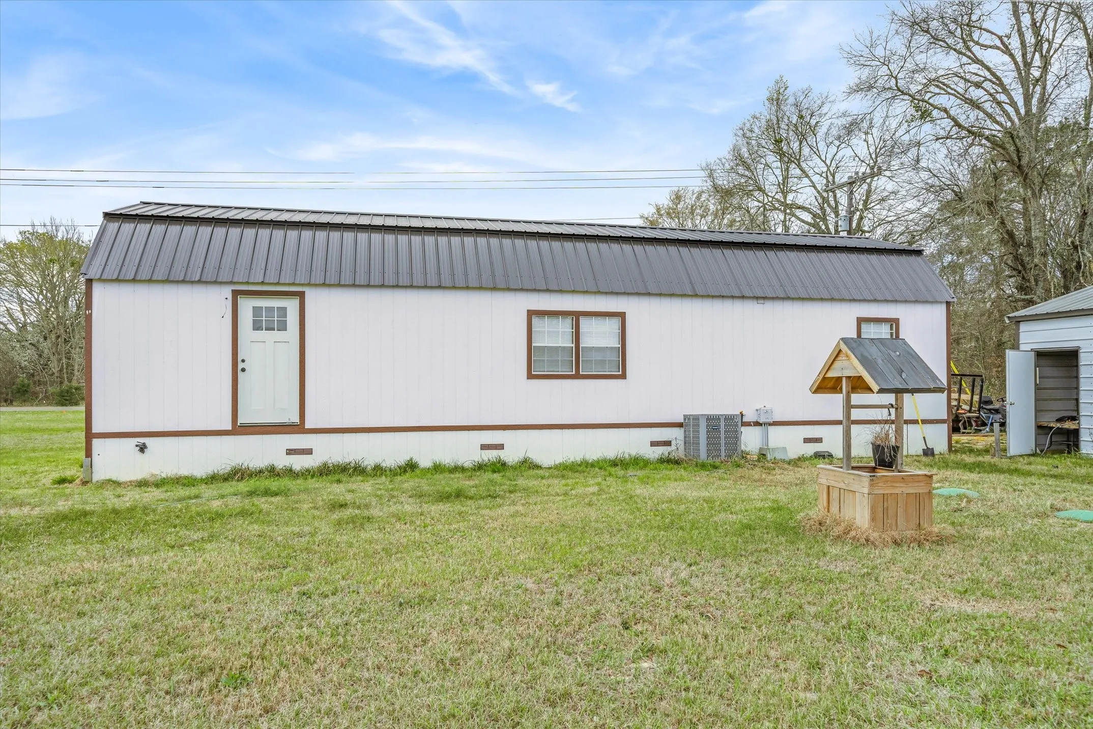 View of outdoor back side of home