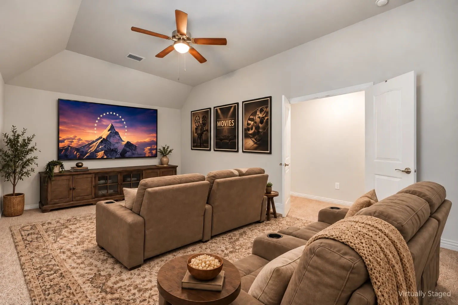 Media Room - Vaulted ceiling with a ceiling fan, recessed lighting, and carpet flooring