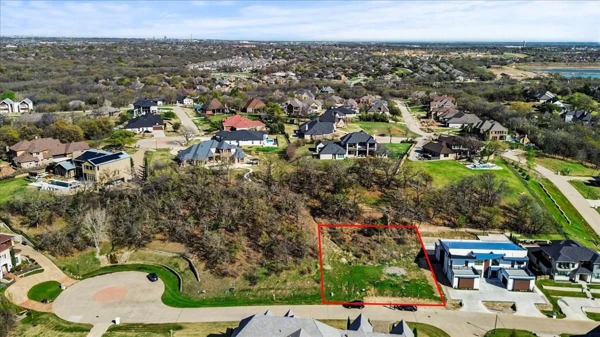 Aerial perspective of suburban area with property boundaries highlighted