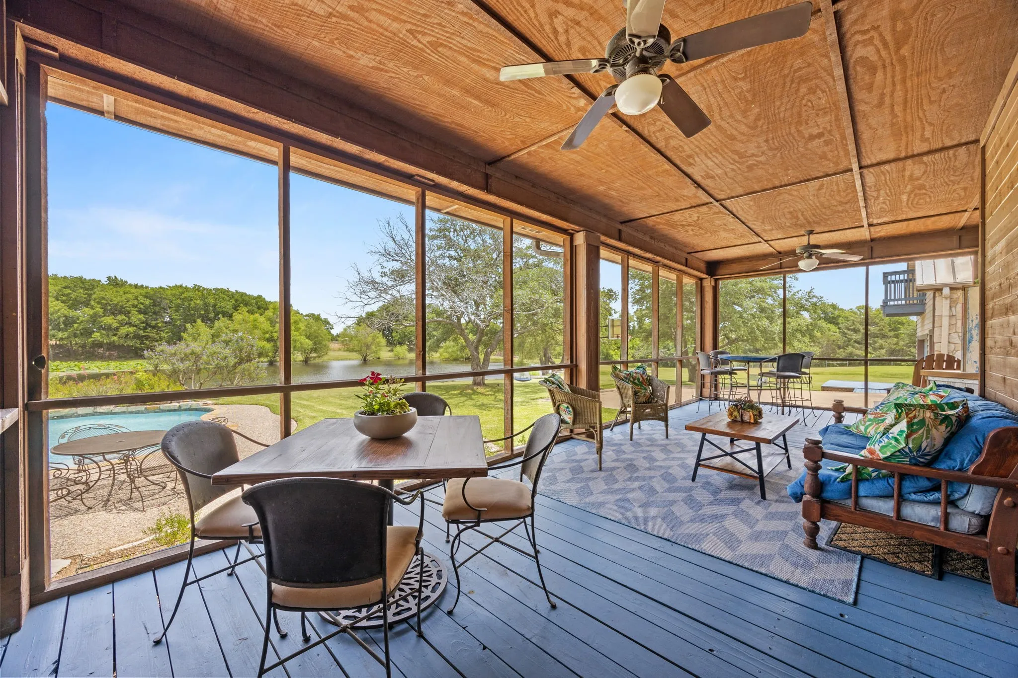 1,350' sf wrap-around porch—portion screened-in