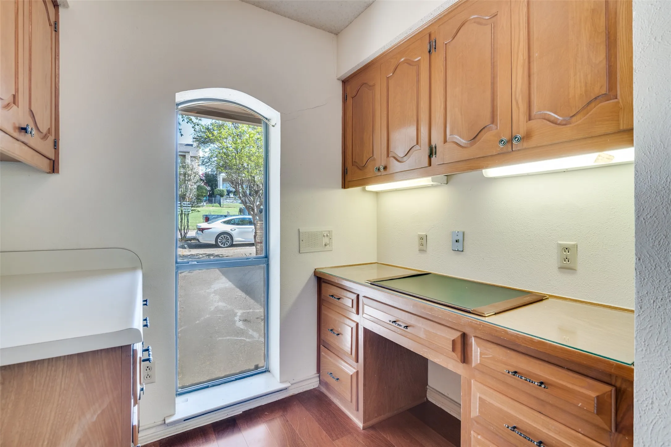 The built in desk in the laundry room is a great catch all place.