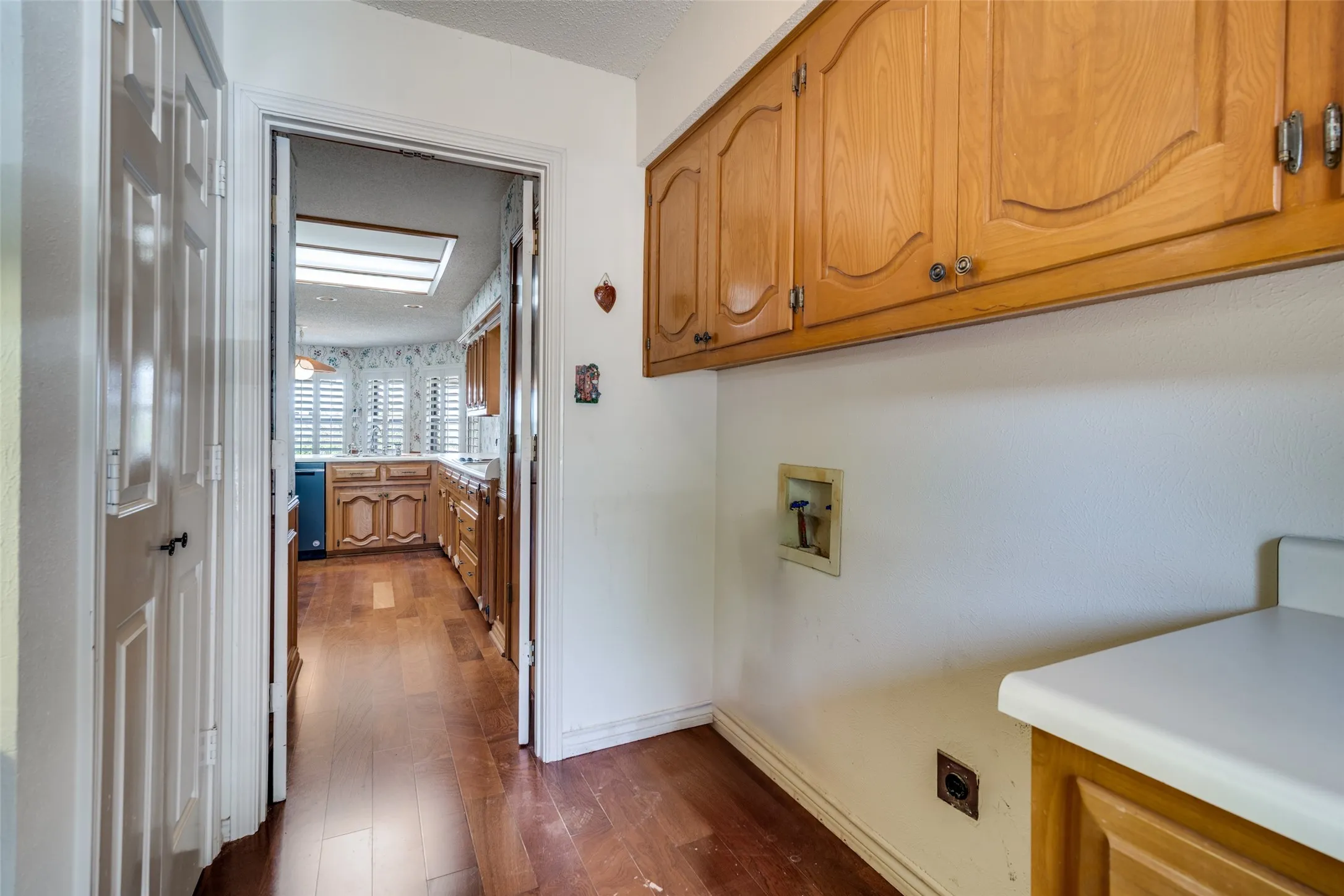 Laundry room is located off of the kitchen