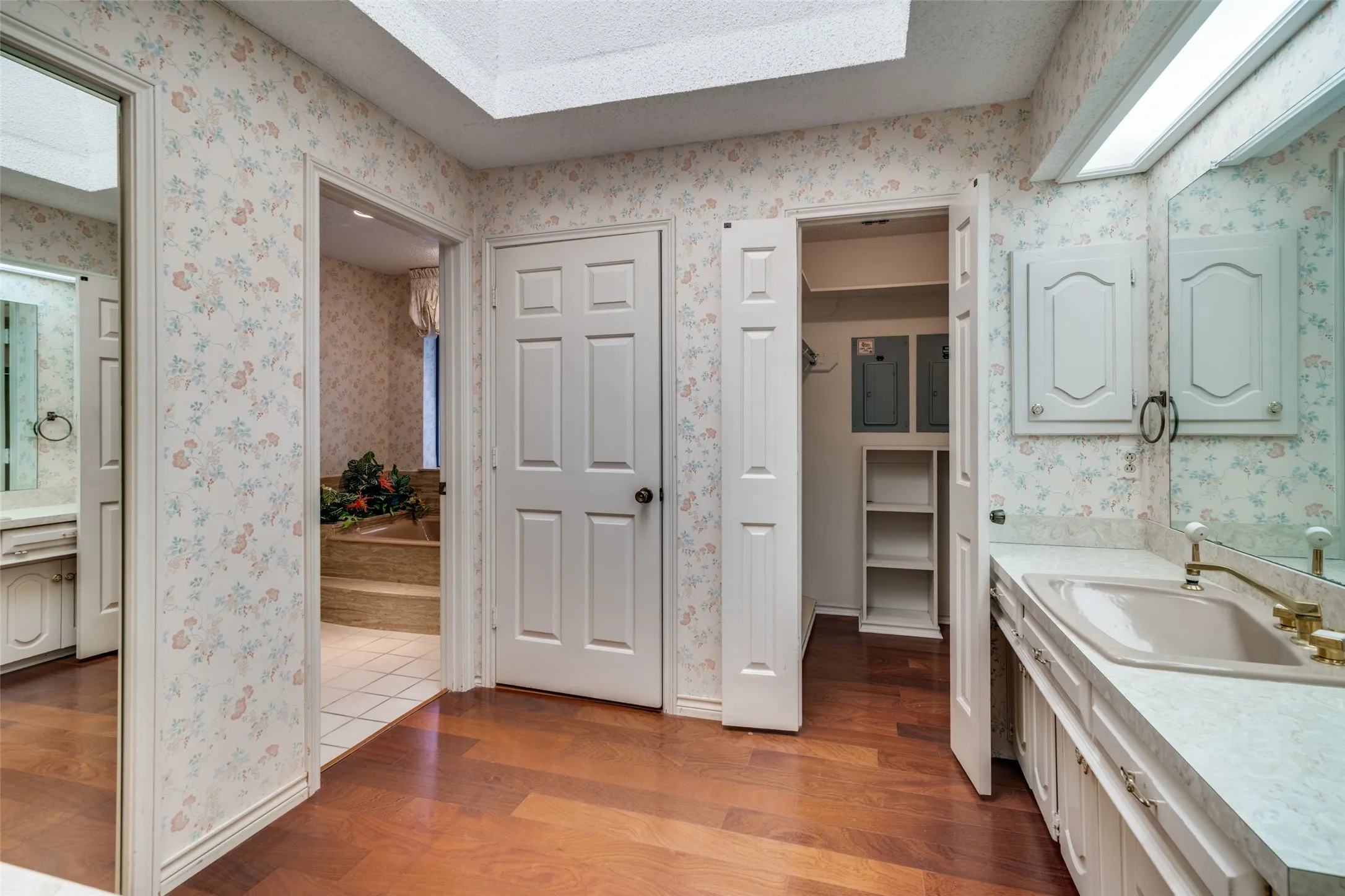 Primary bathroom has 2 closets