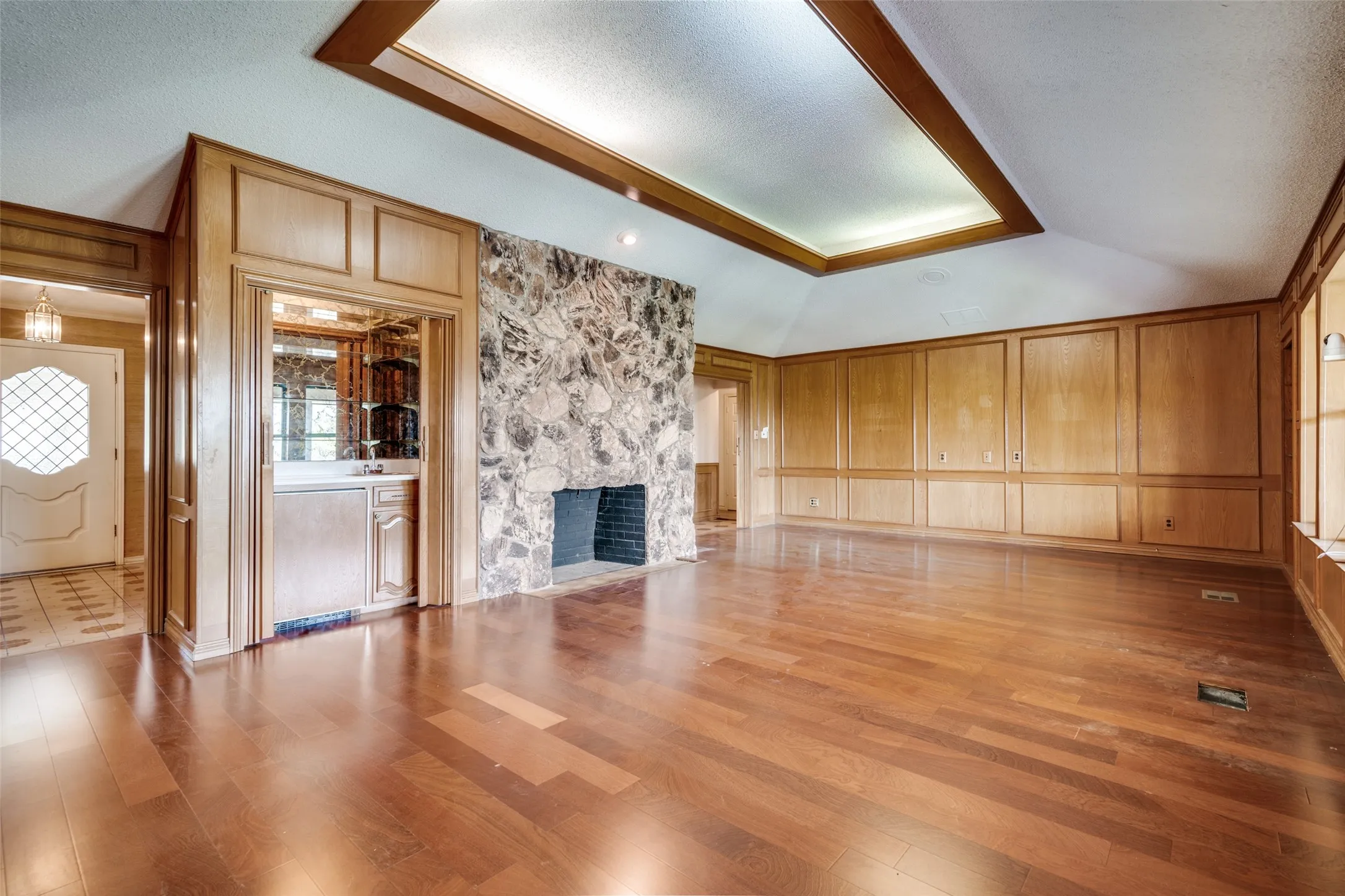 A wet bar in the living room makes entertaining a breeze