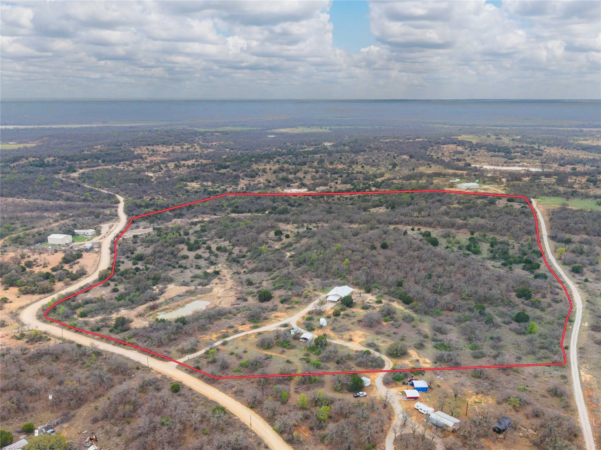 Home on 60 acres per survey, AMAZING View for miles with Lake Brownwood in distance, Boundary lines are approximate.