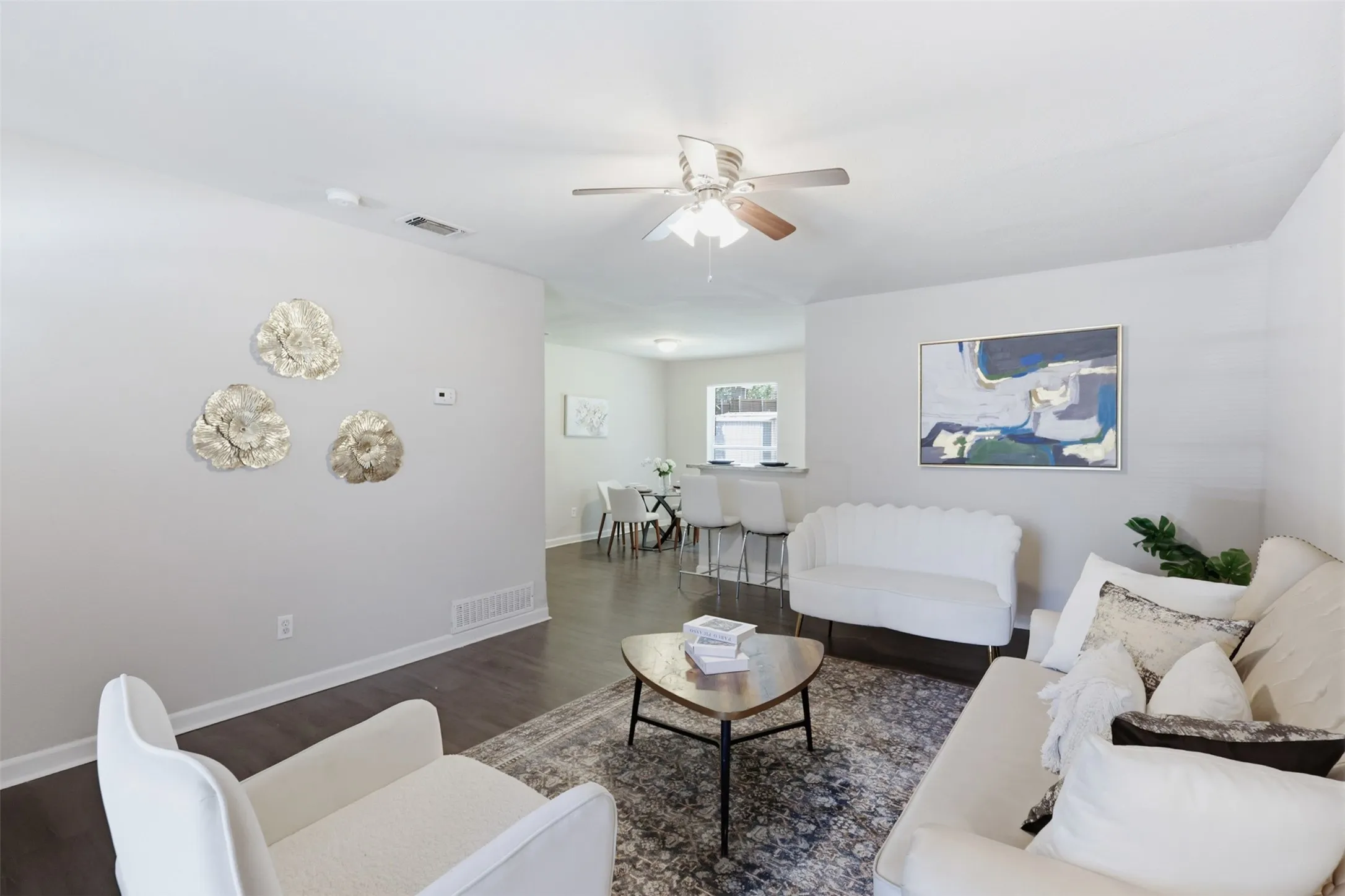 Open the door to this beautiful open concept home with laminate flooring throughout.