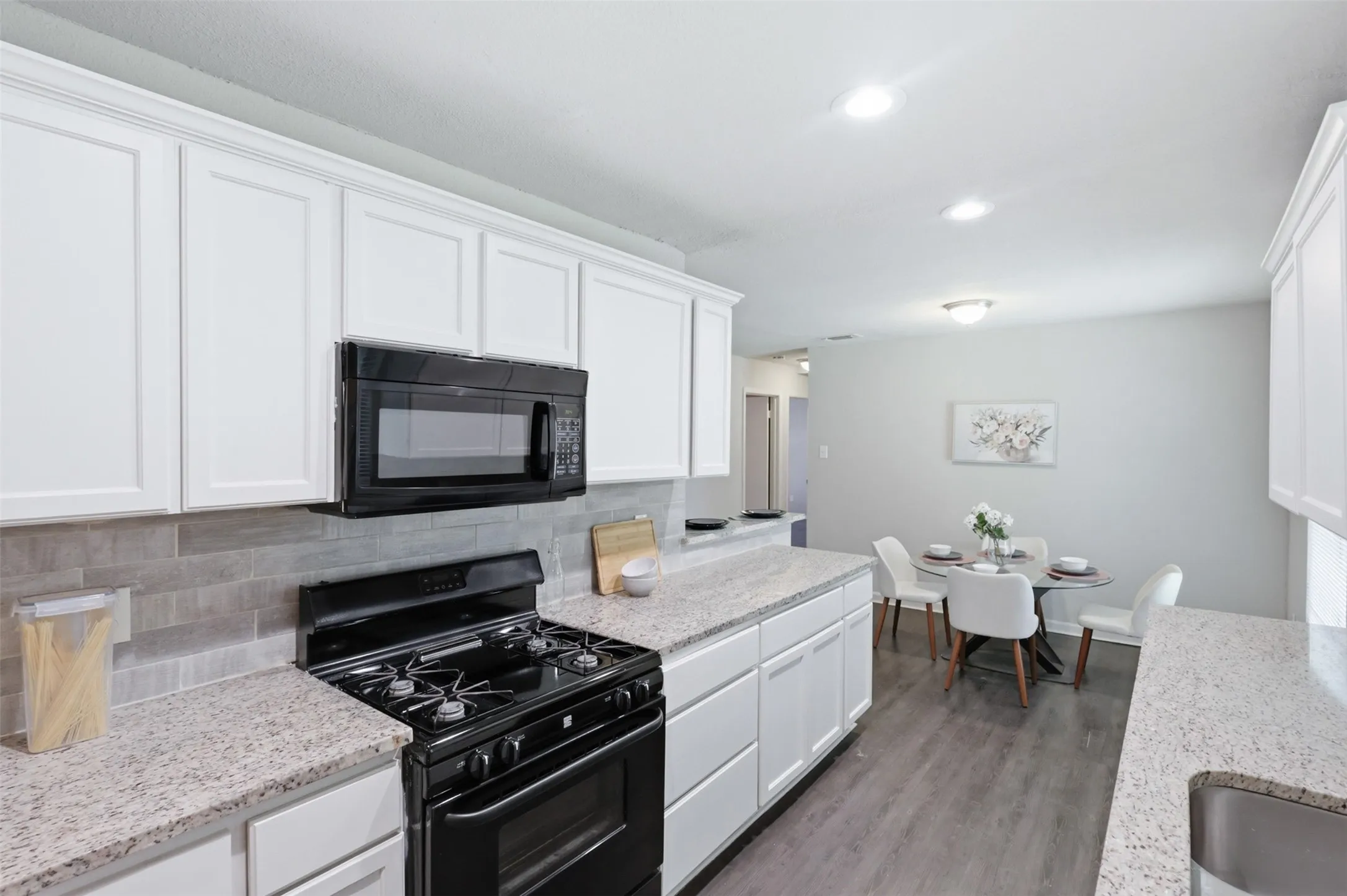 Open Concept to Dining Area allows for easy conversations during meal prep.