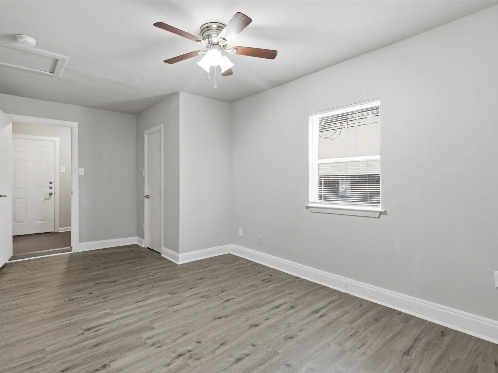 Huge converted garage space with closet makes it perfect for a bedroom or play area.