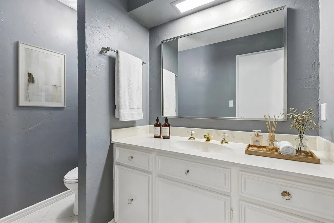 Half bath near main living room - Virtually Staged