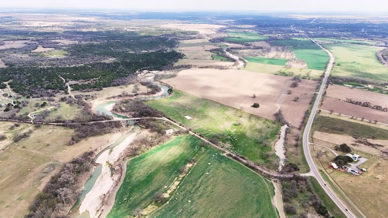 Aerial overview of property's location with rural landscape