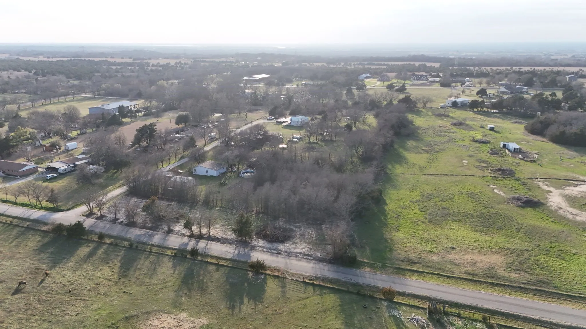 Aerial view of property's location with rural landscape