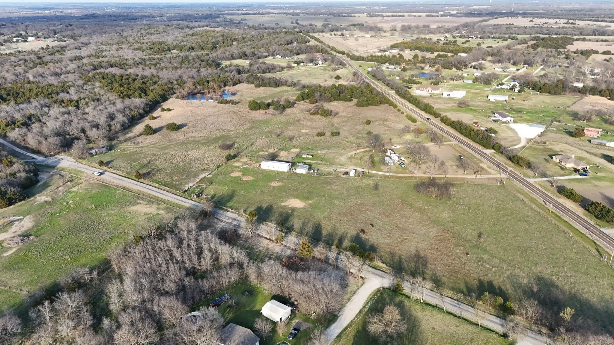 Aerial view of property's location with rural landscape