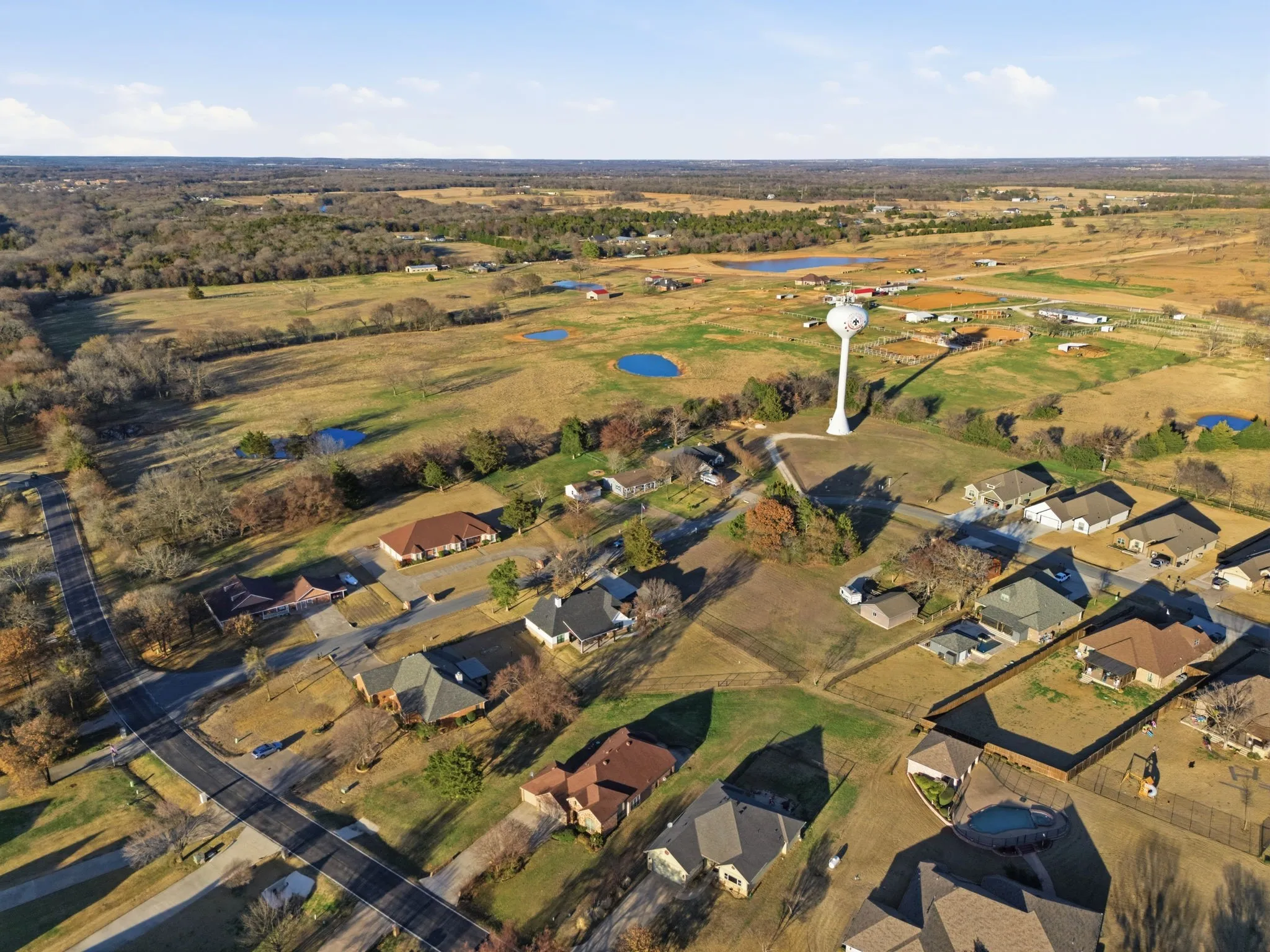 View of property location featuring nearby suburban area