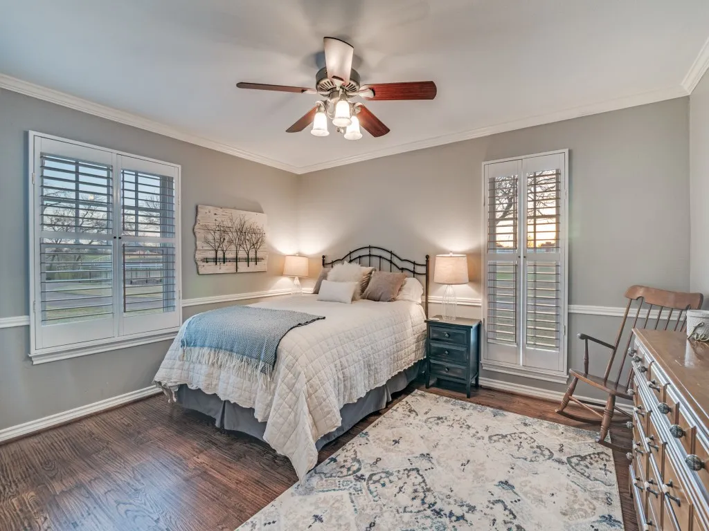 All of the bedrooms are oversized with walk-in closets.  This one is on the first level and has an ensuite bath, wood floors and great views.