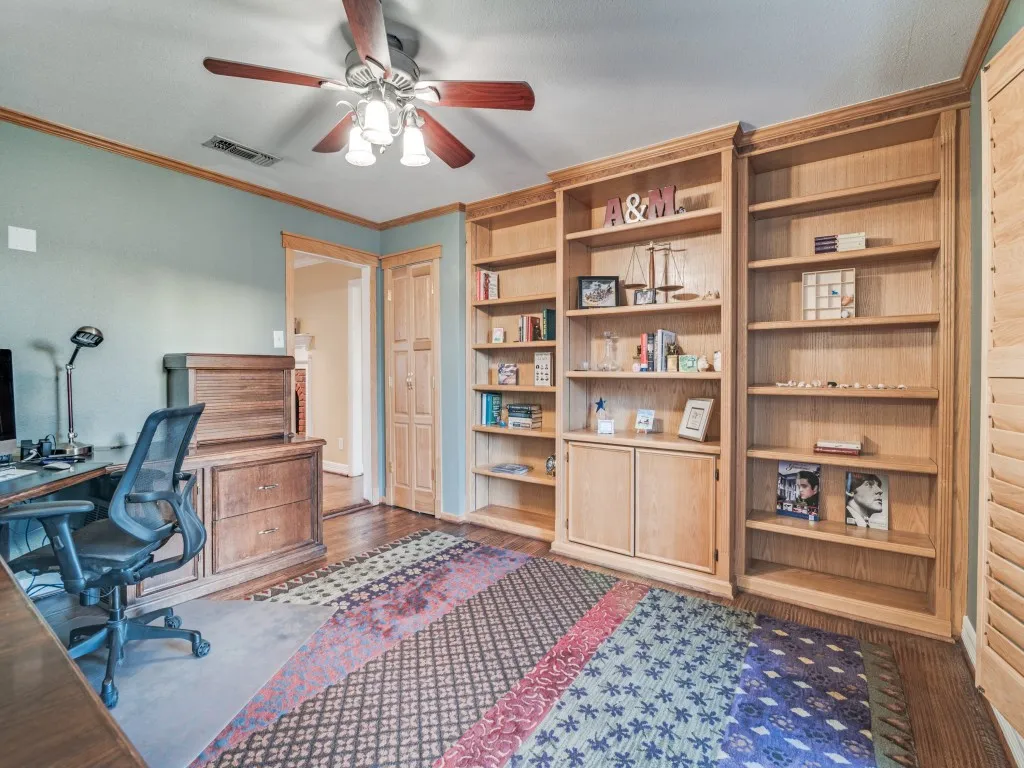 Fabulous office with wood floors and built-ins!