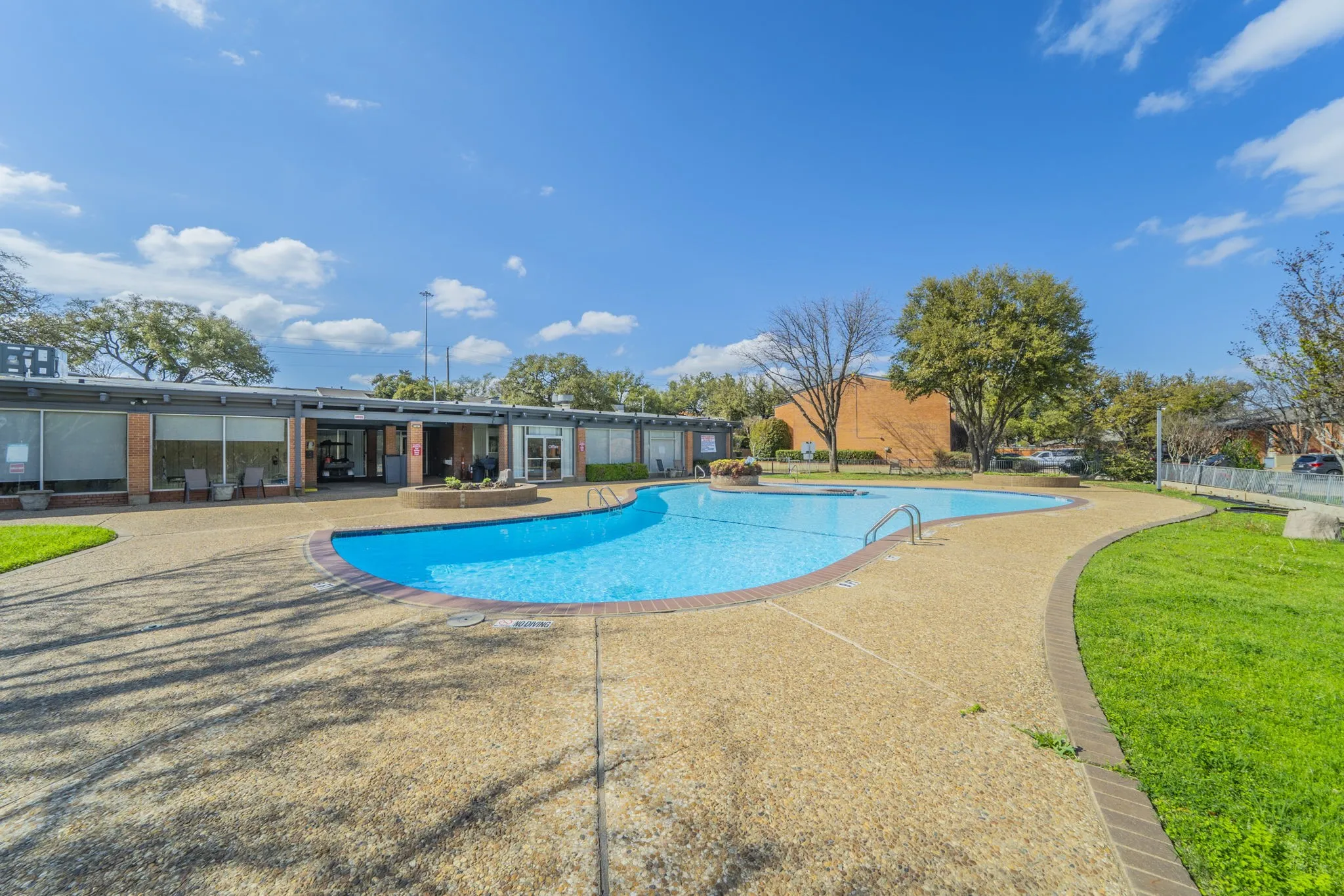 Sparkling community pool is located directly across from the unit.