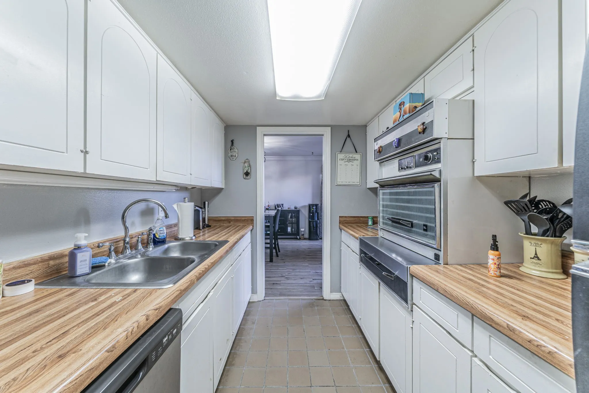 Kitchen is open to the Dining room.