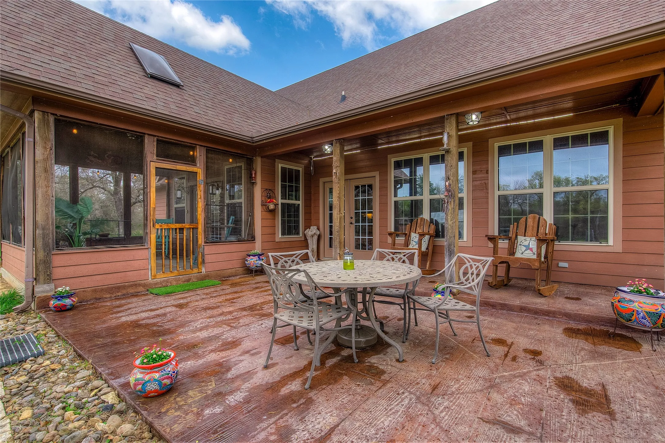 Back patio featuring an outdoor dining space.