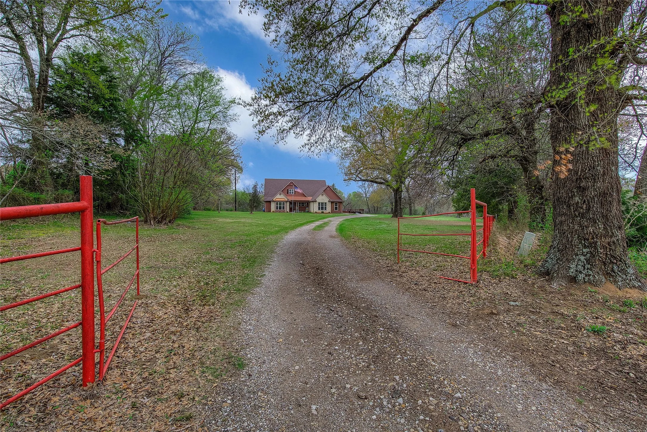 Quiet country living with beautiful trees and open land.