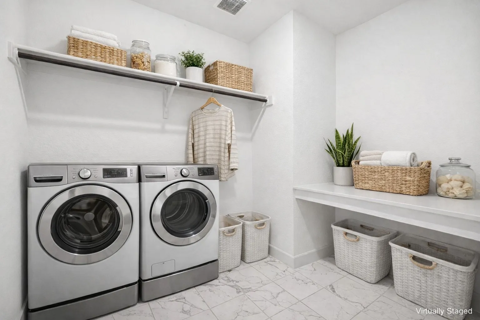 2nd floor Laundry area with separate washer and dryer and light marble finish flooring