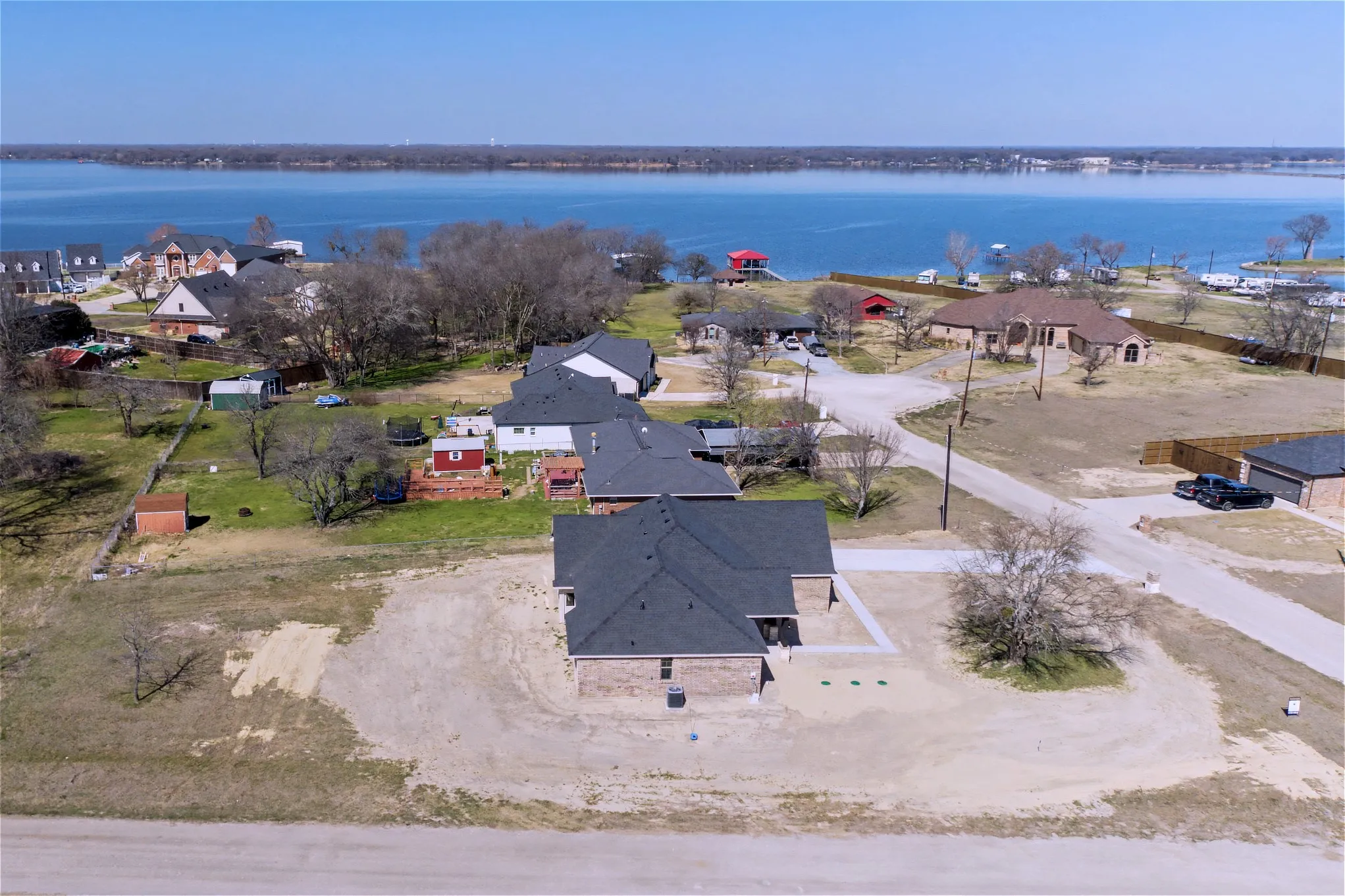 Aerial view of residential area with a large body of water