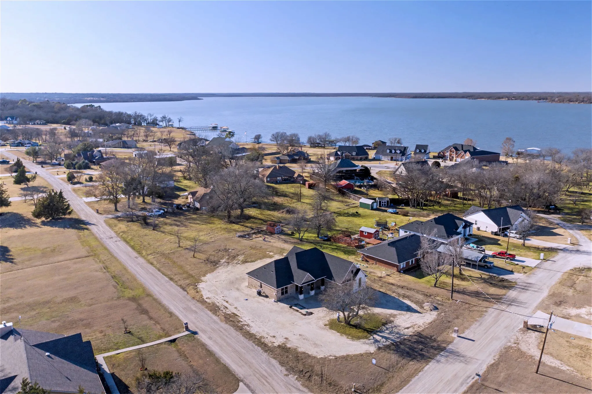Aerial view of residential area with a nearby body of water