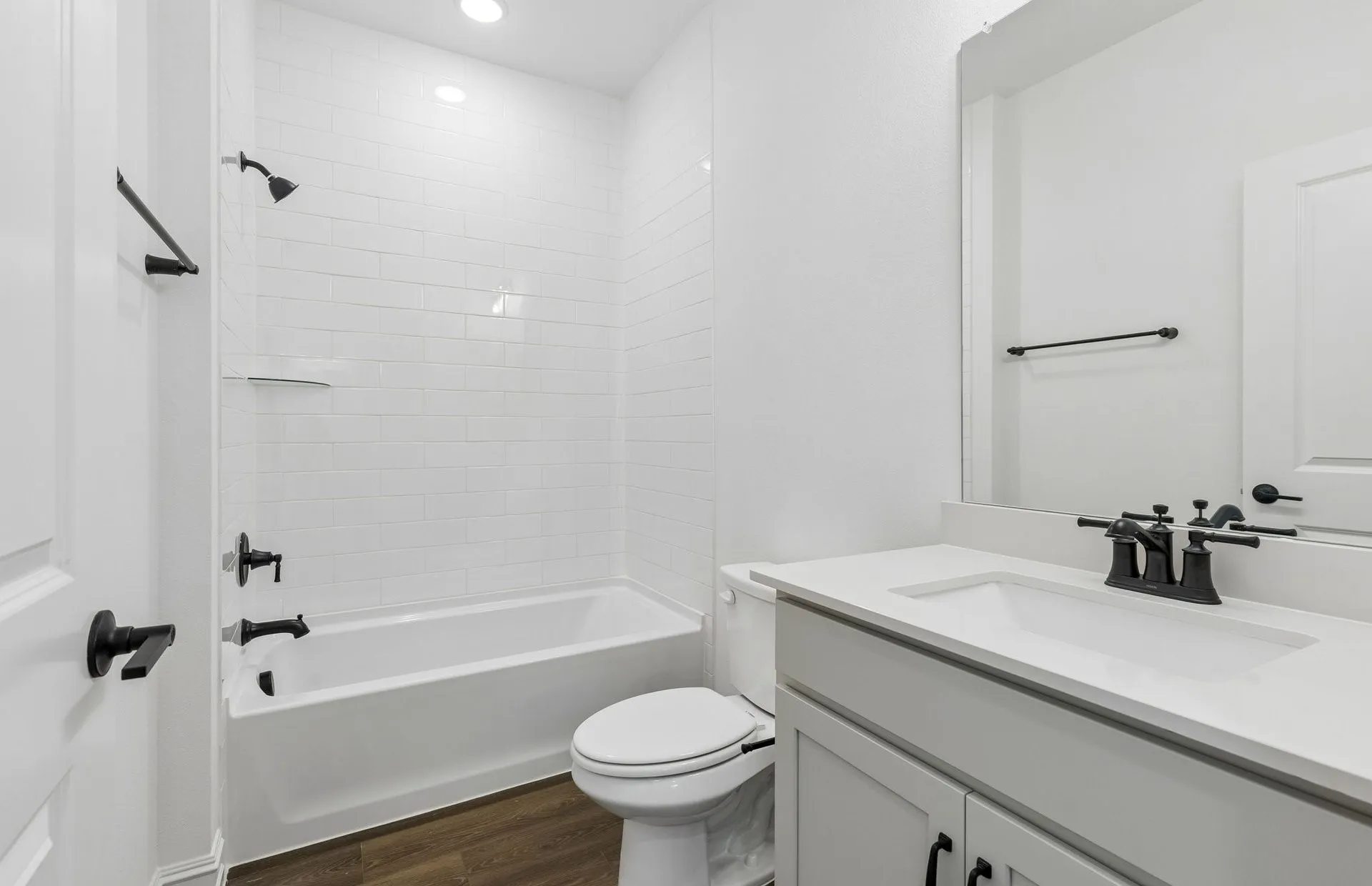 Secondary bath with tile surrounded shower