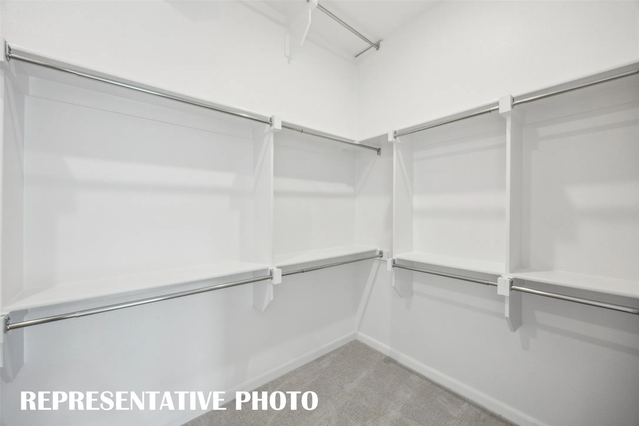 Featuring 3rd row seasonal hanging and tons of space, your dream closet awaits!  REPRESENTATIVE PHOTO