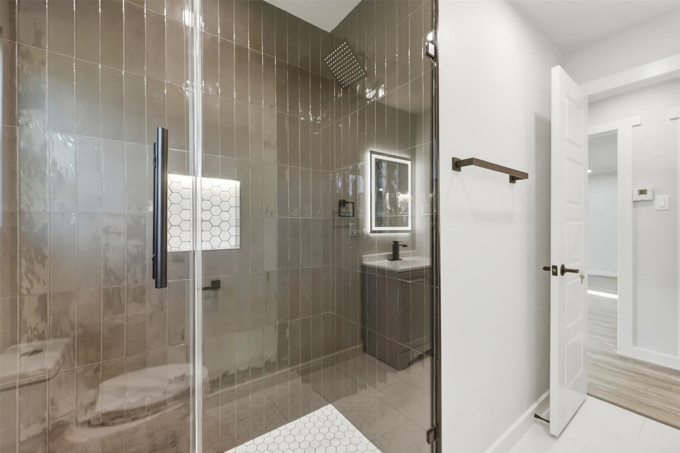 Beautifully tiled, brand new shower.