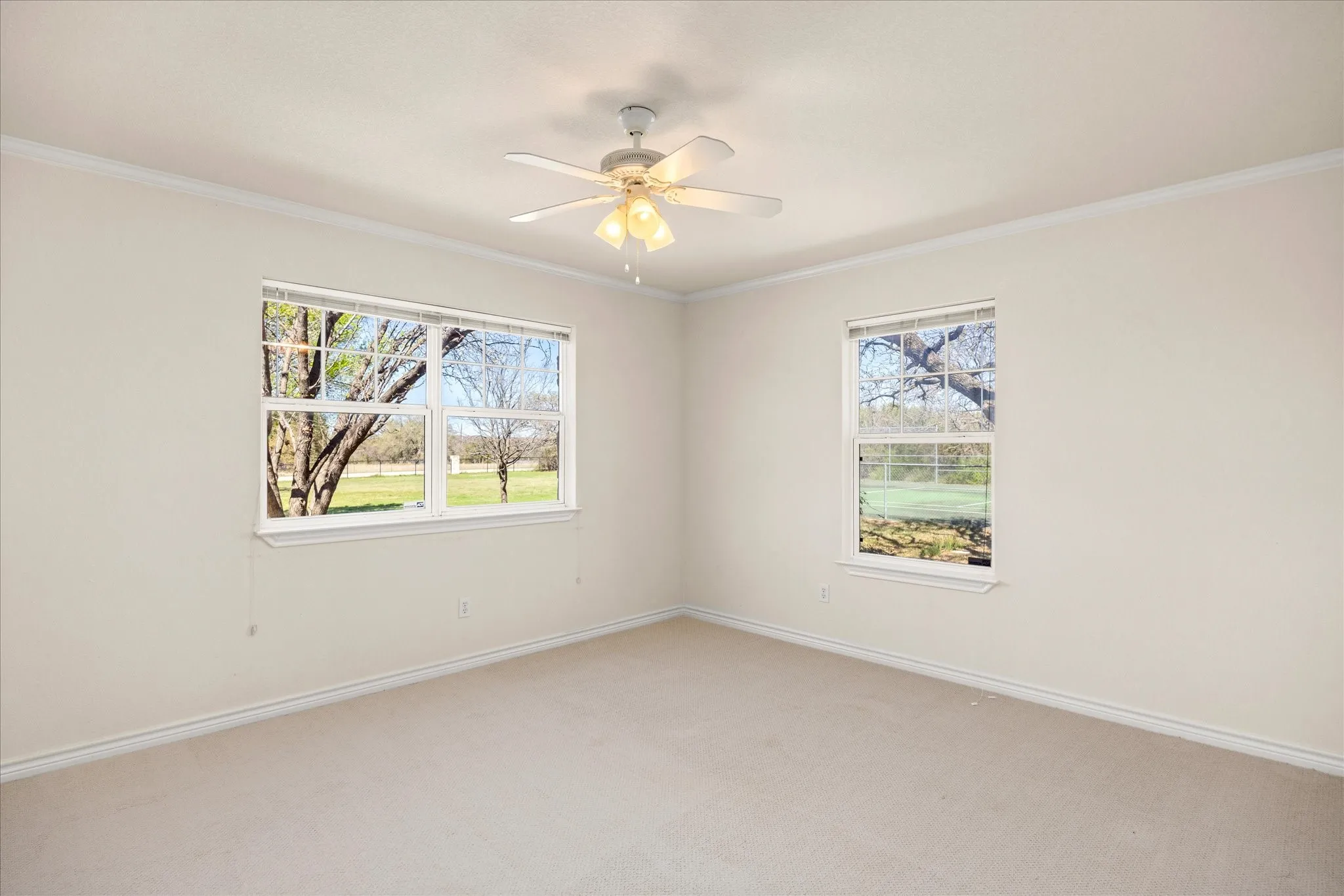 This is the 3rd bedroom which has lots of light and a walk in closet.