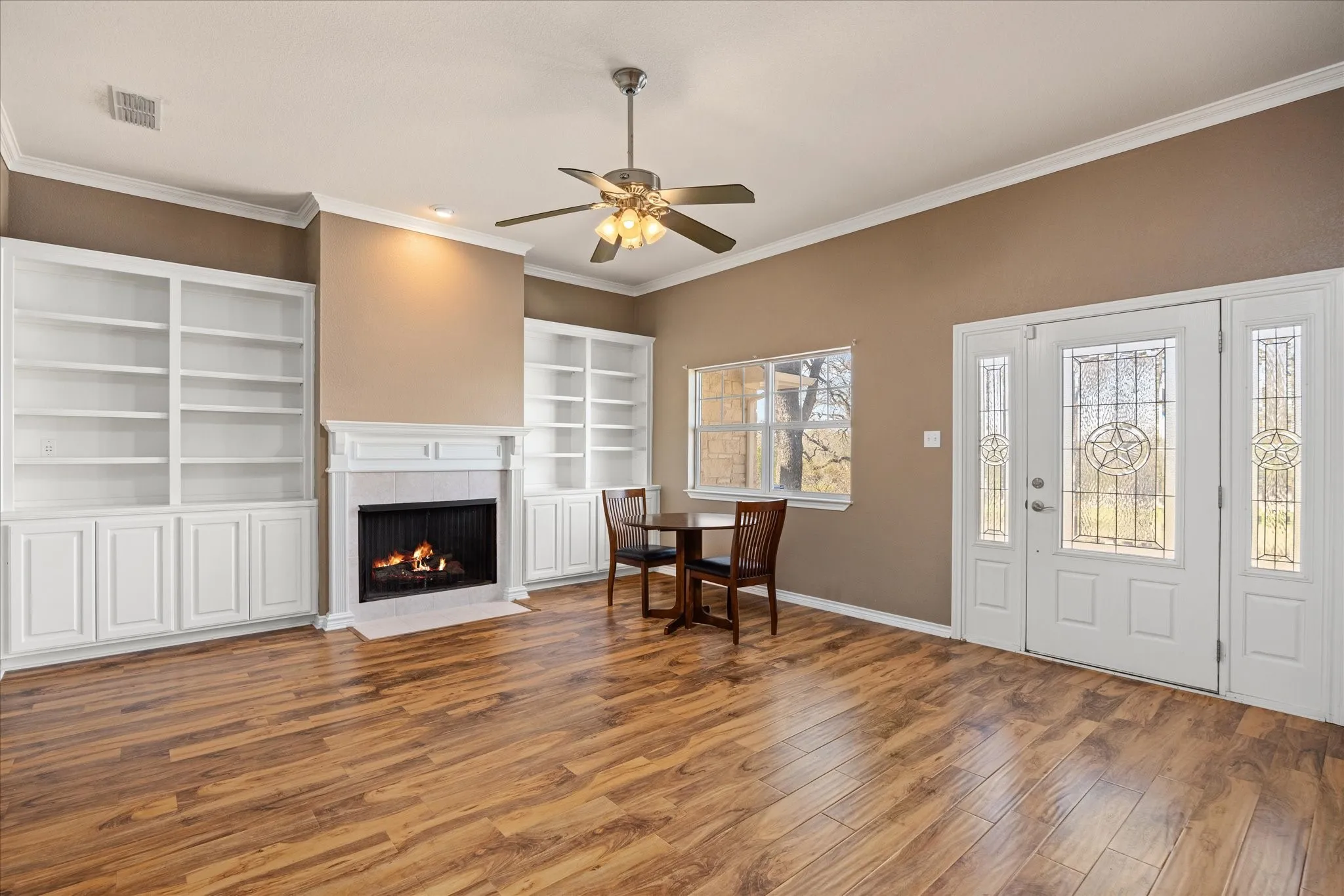 The is the front living area with lots of built ins and a gas fireplace