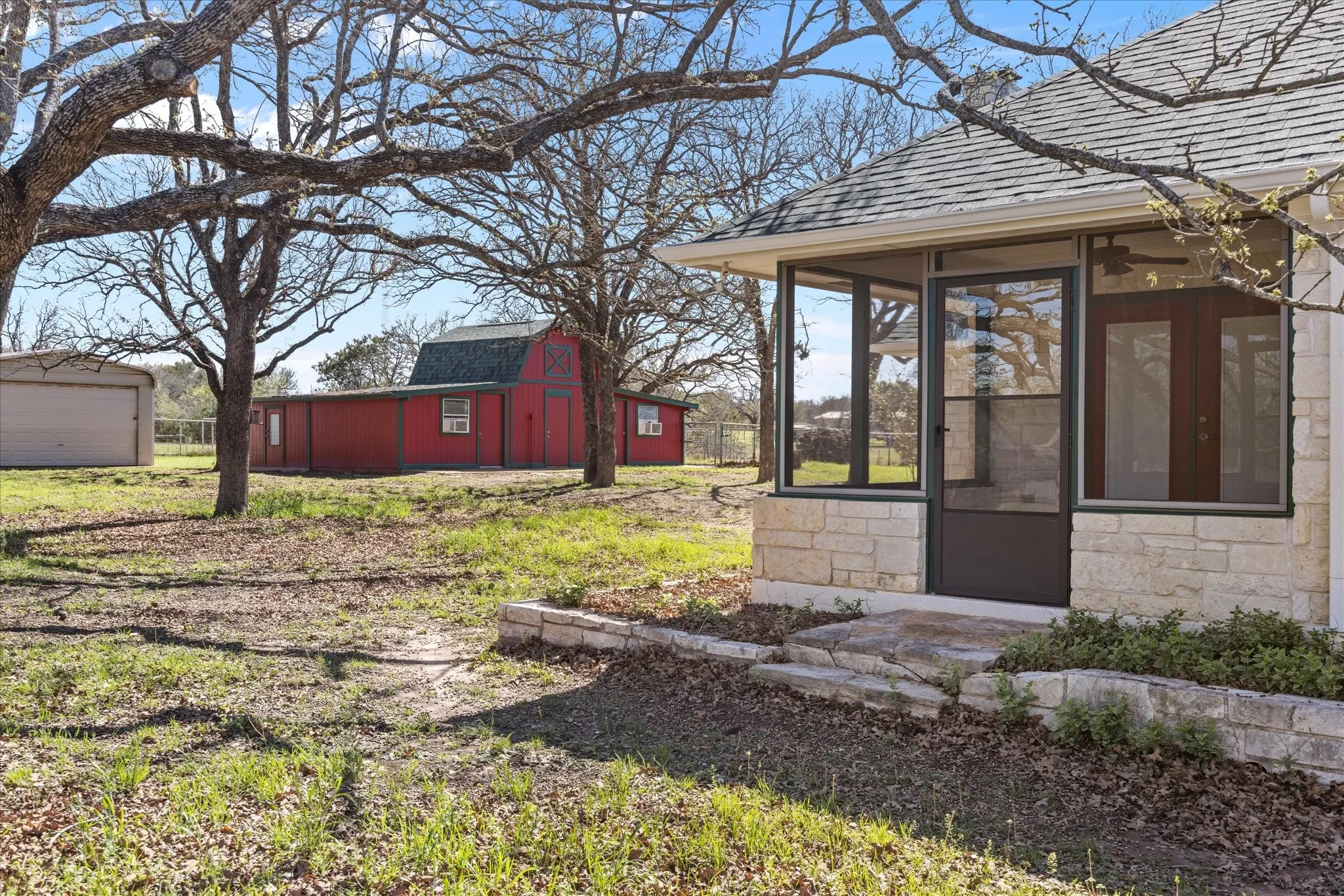 Close up of the screened in porch at the rear of the home.