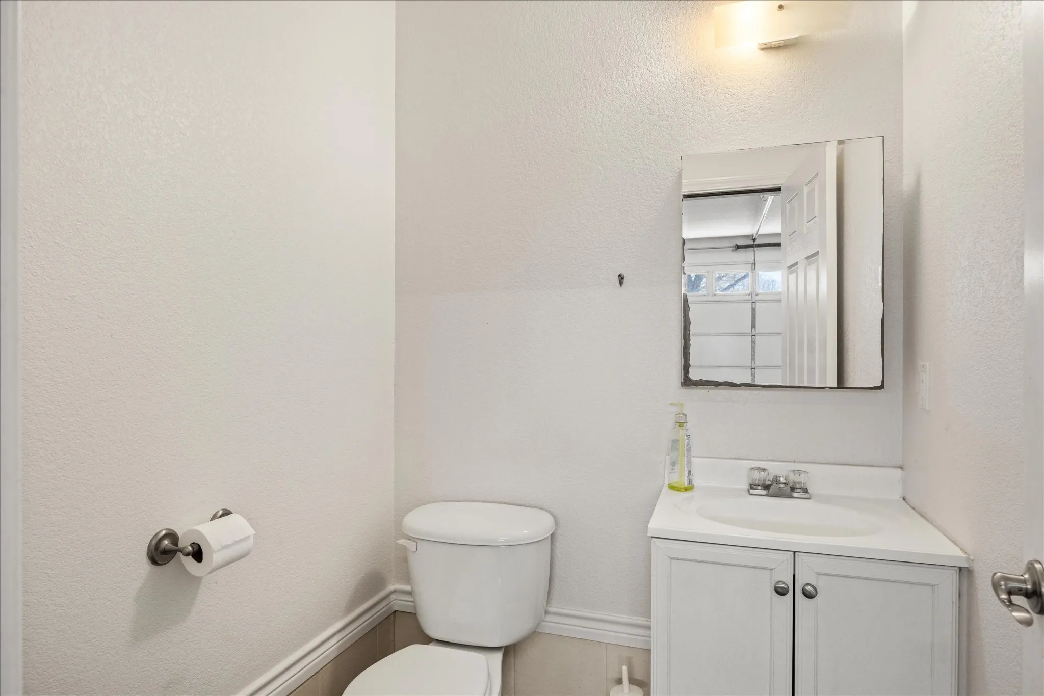 This secondary Bathroom has a tub shower combo. Is wheelchair accessible