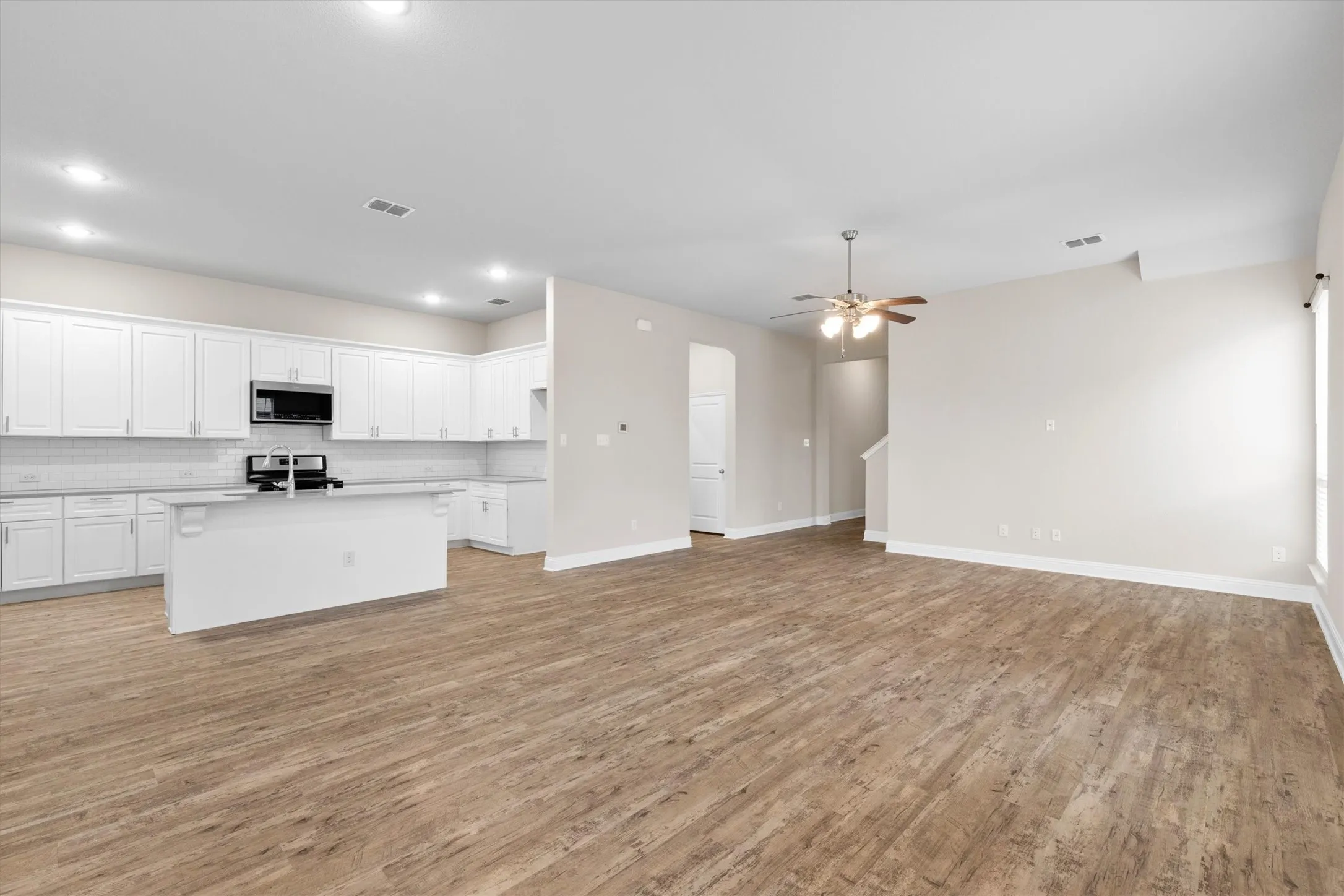 Dining area looking at the living room & kitchen