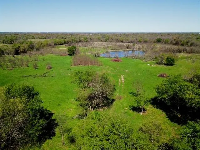 View of rural area with a nearby body of water