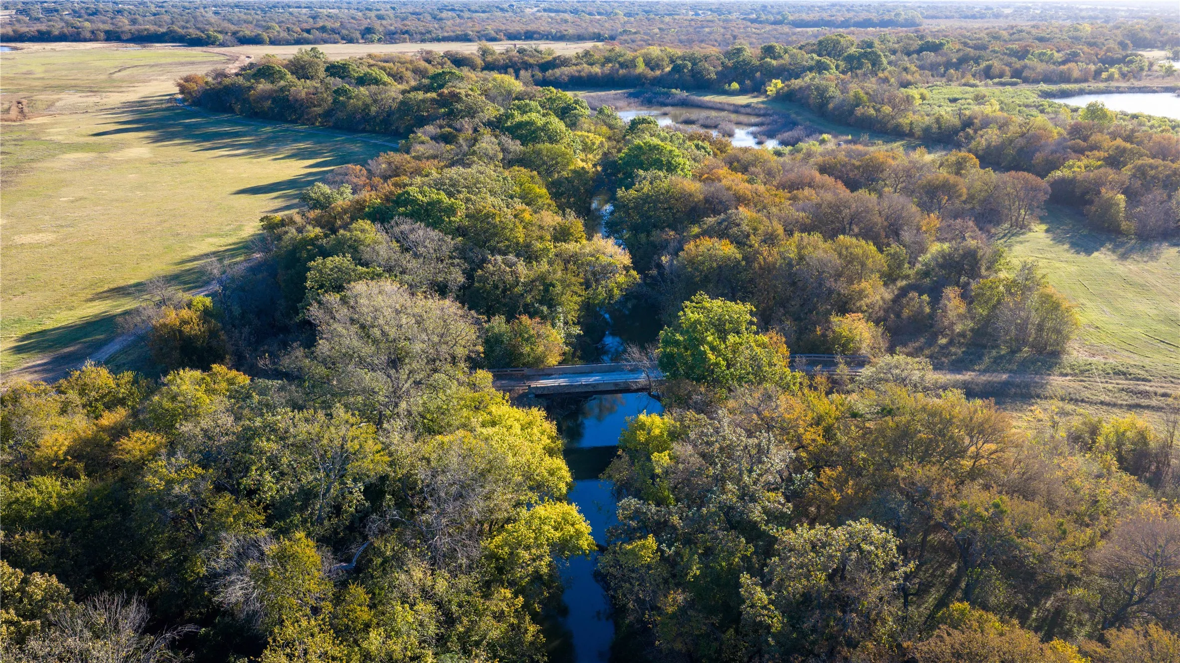 Aerial view of Big Sandy Creek and natural habitat.