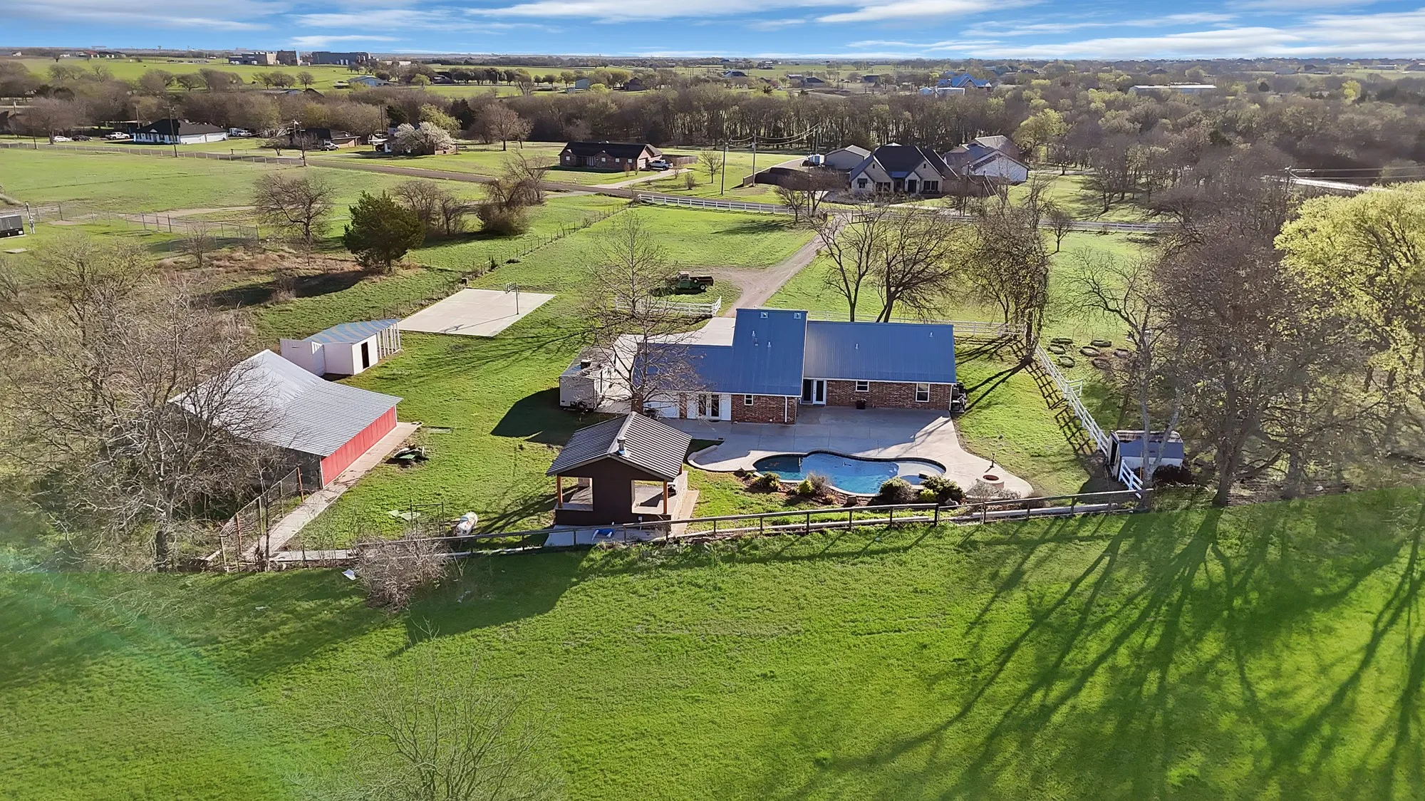 View from above of property with a pool