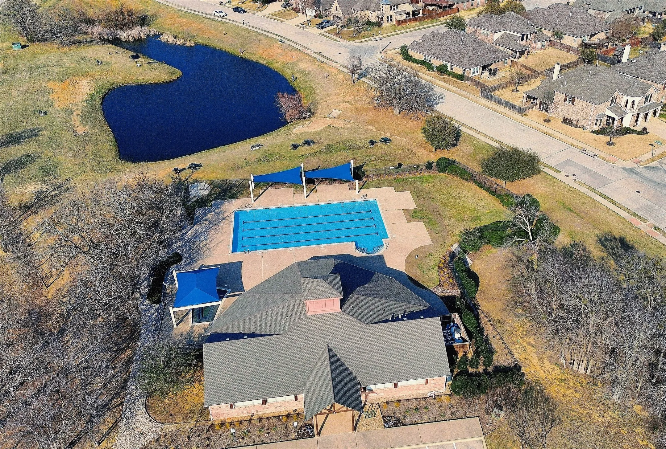Nearby community pool and pond