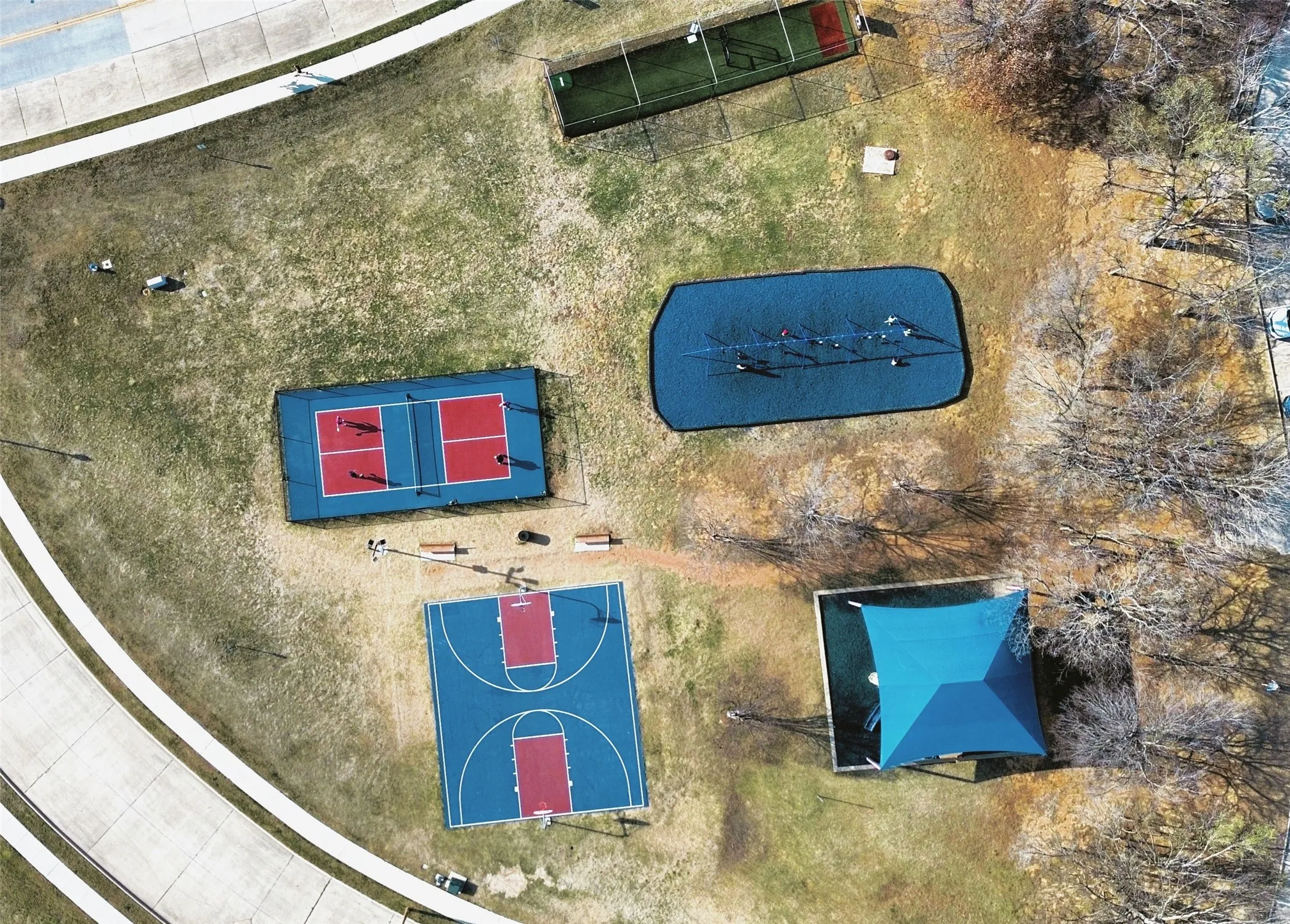 Nearby park with playground, basketball and pickleball courts