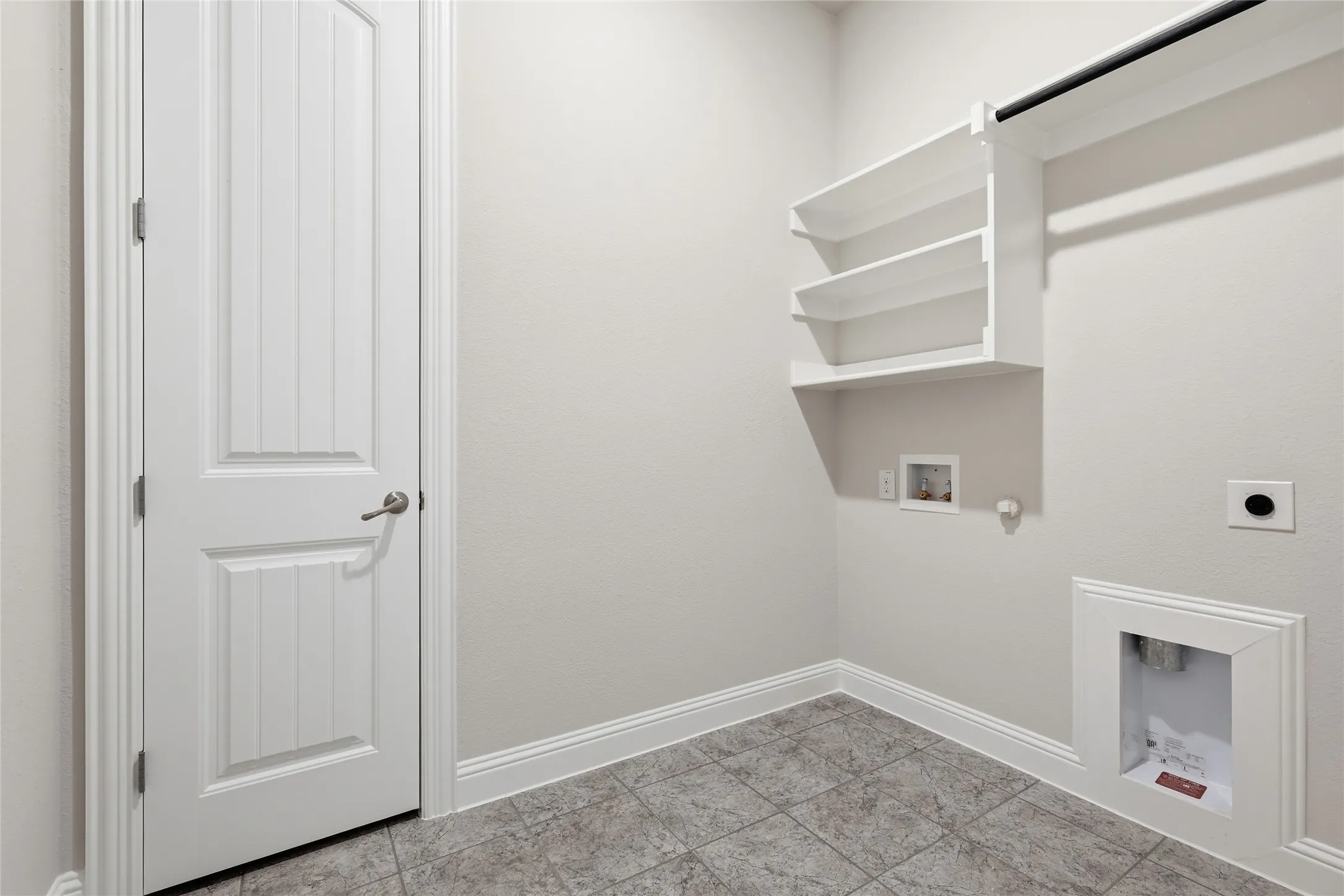 Laundry room with hookup for a gas dryer, washer hookup, and hookup for an electric dryer