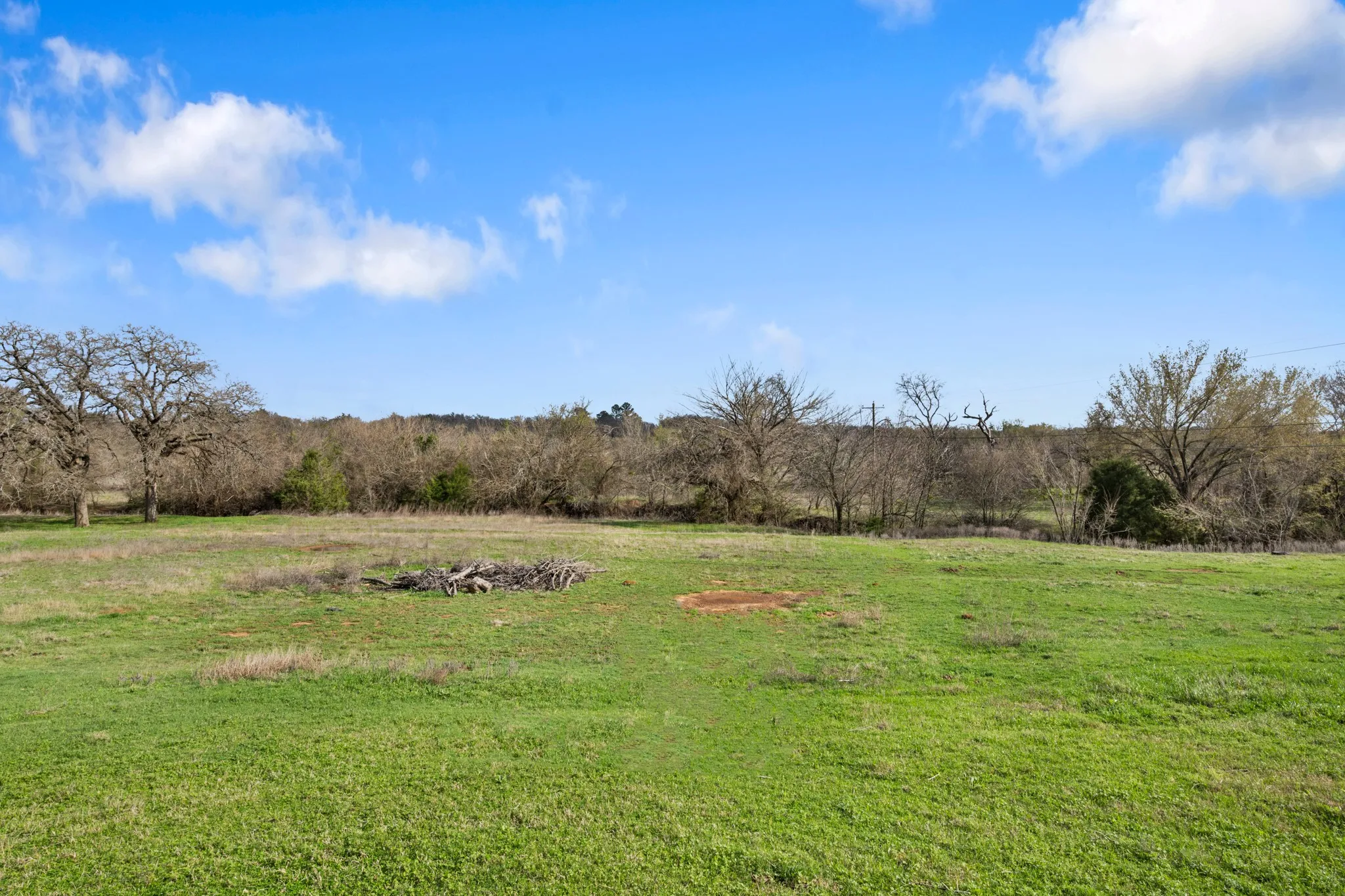 View of grassy yard with a rural view