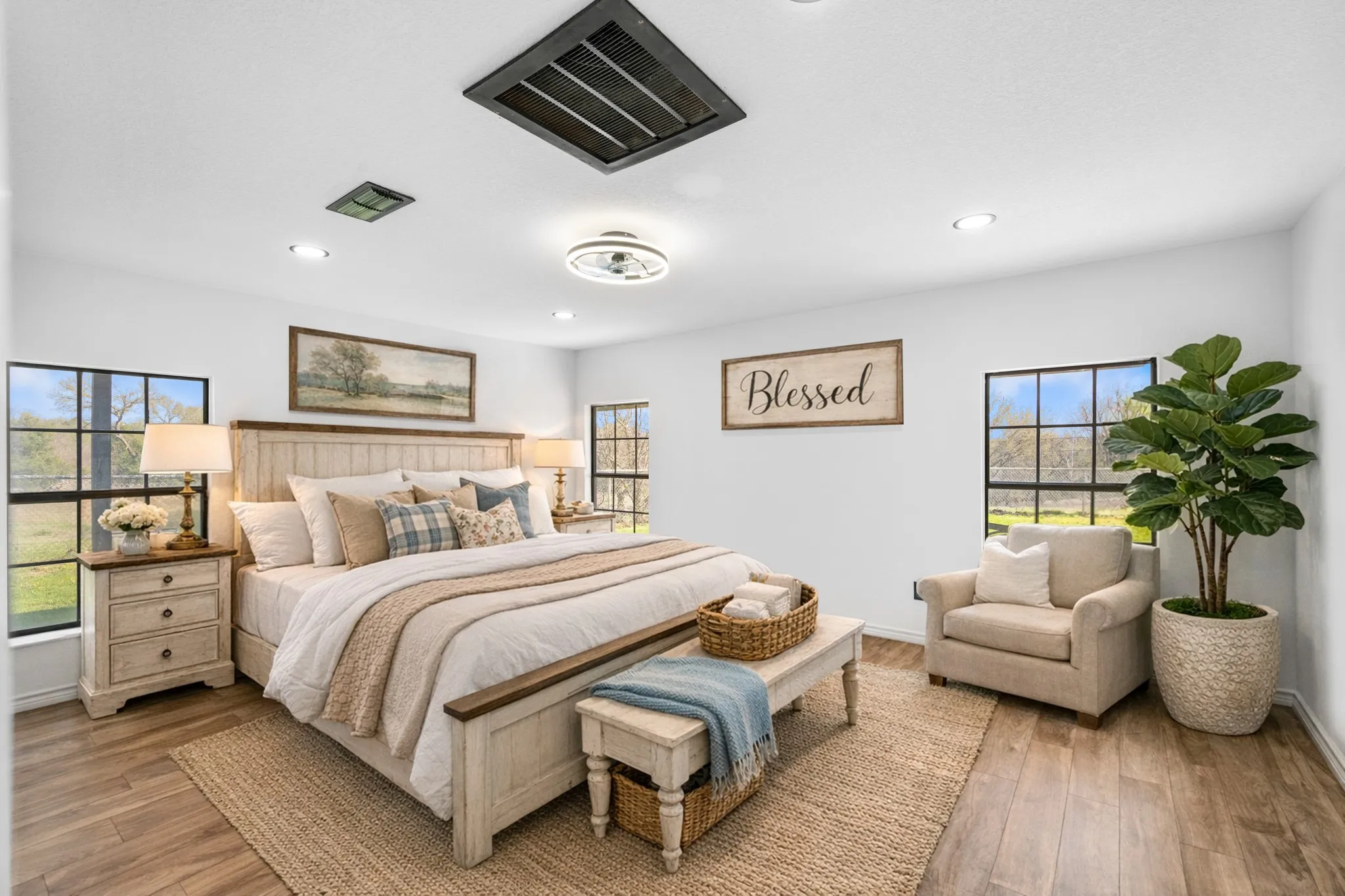 Bedroom with light wood-style floors and recessed lighting Virtually staged to show use of space