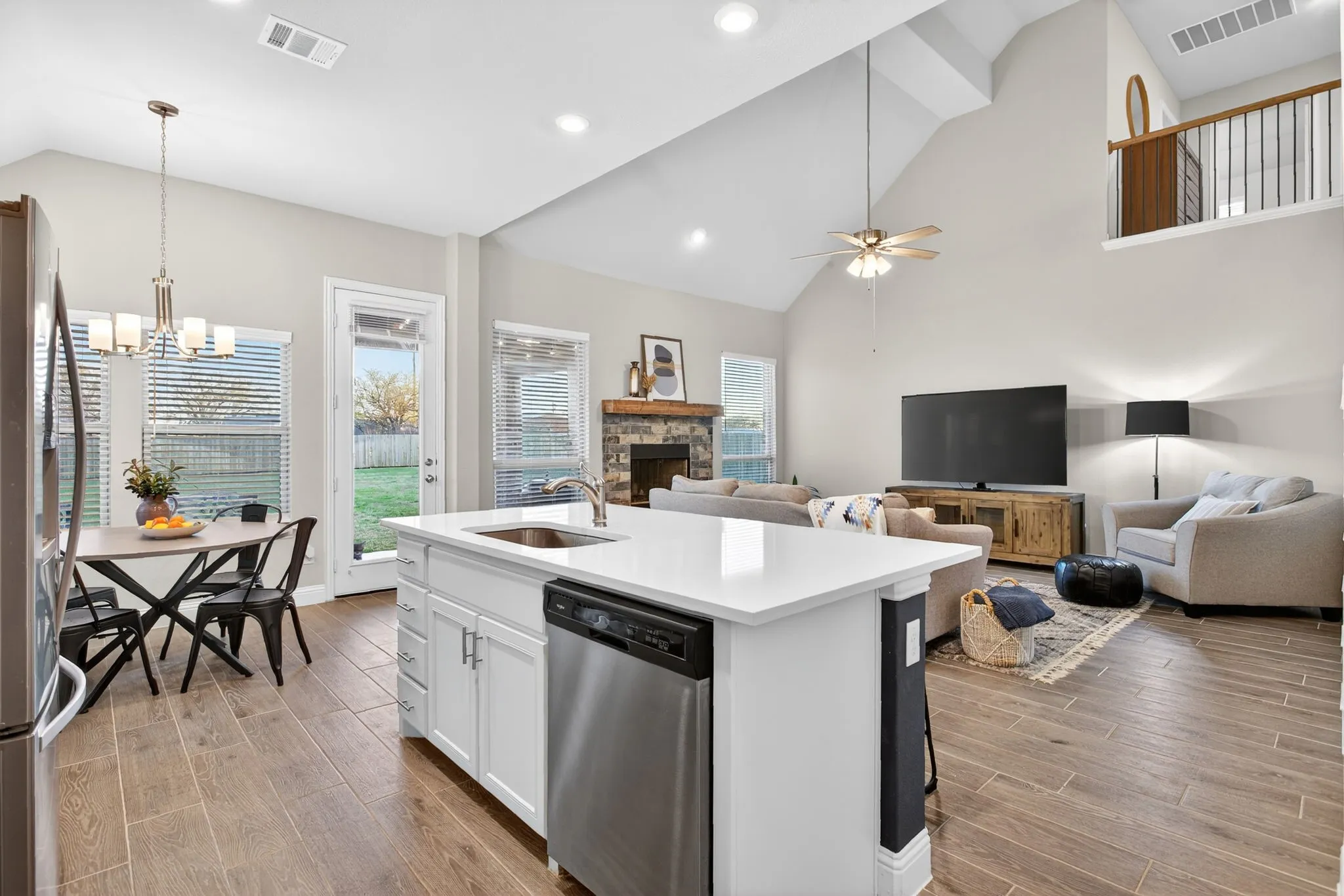 Another view with a peek of the upstairs loft area.