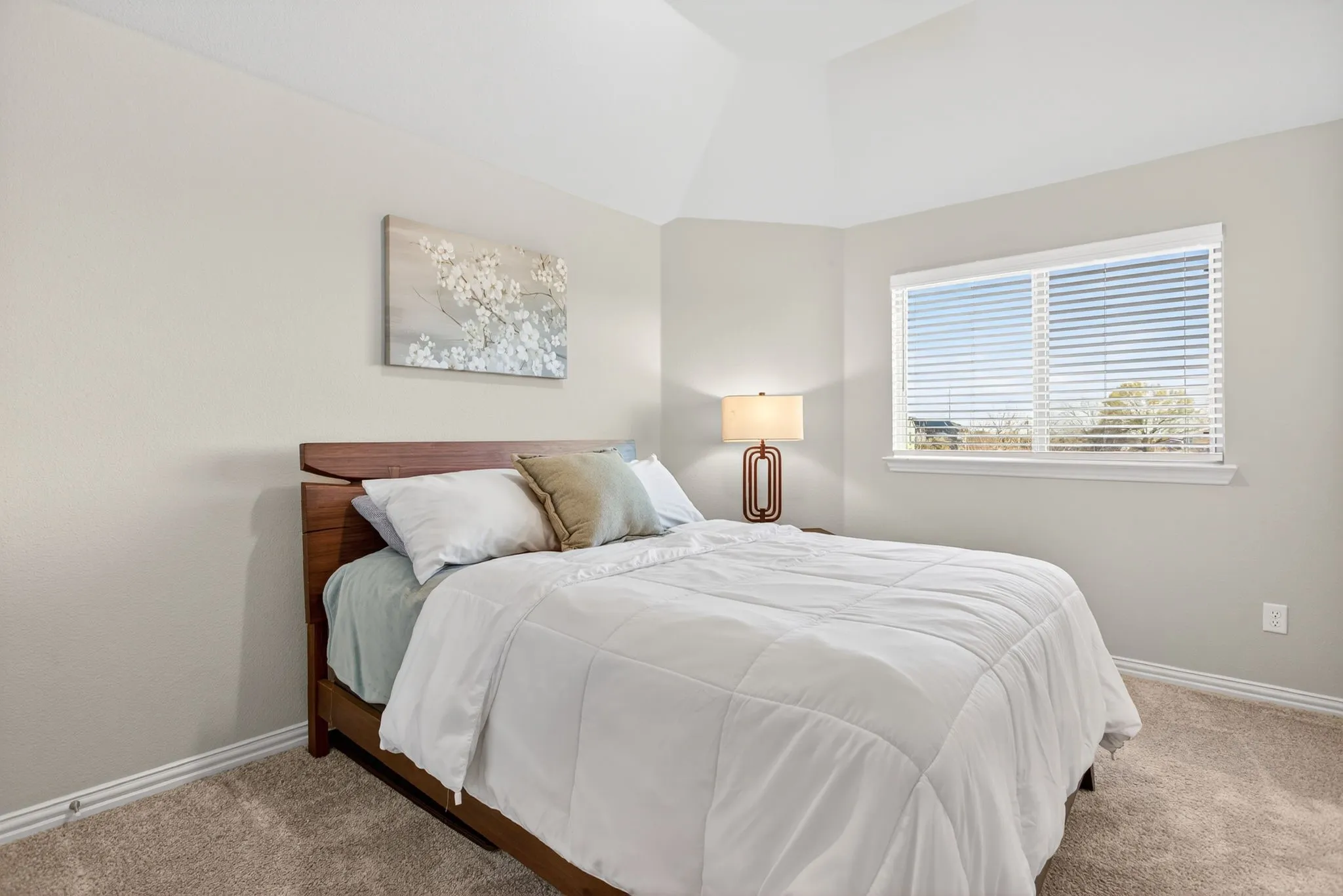Bedroom with high ceilings and good-sized closet.