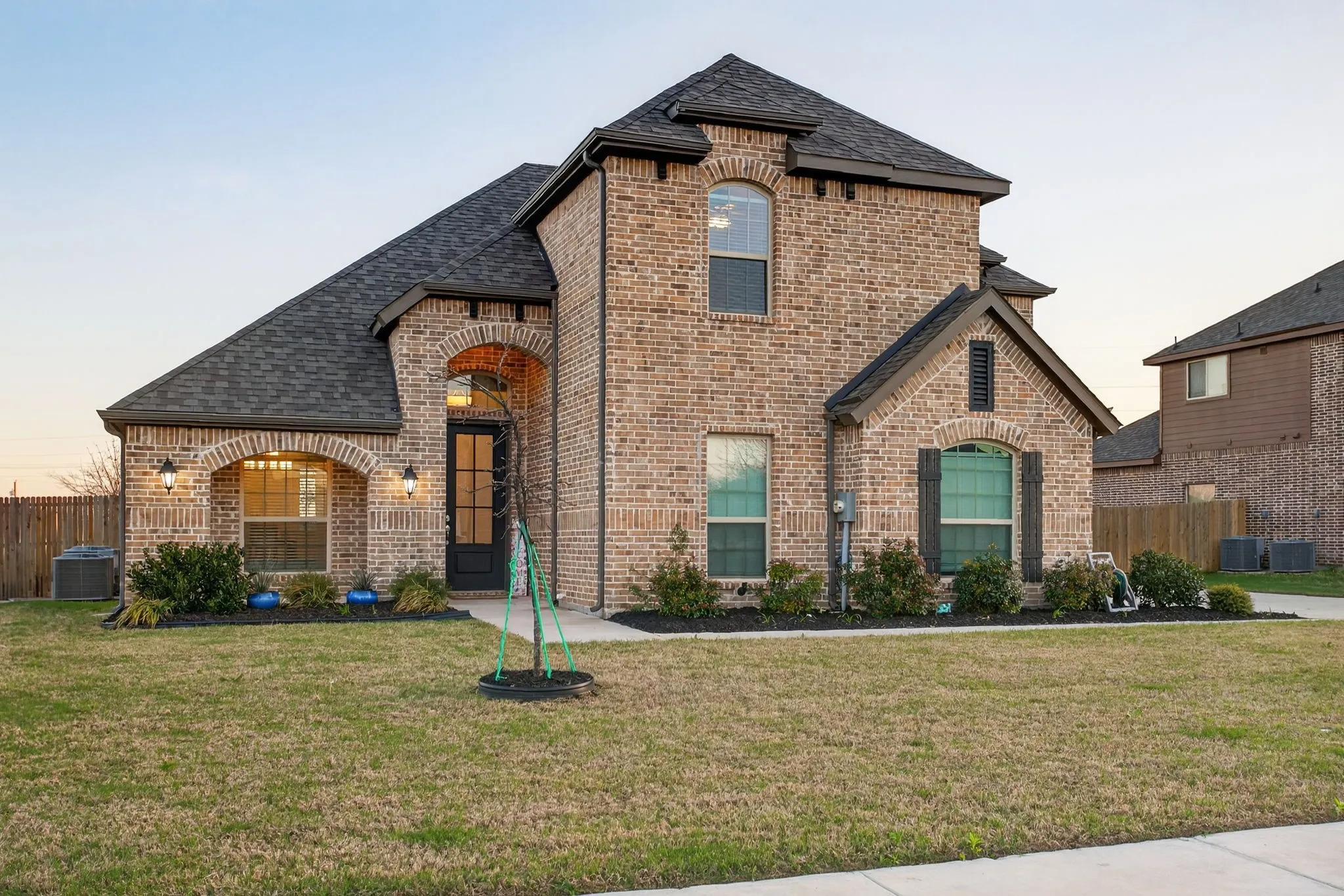 Stunning brick facade; handsome curb appeal; huge corner lot.