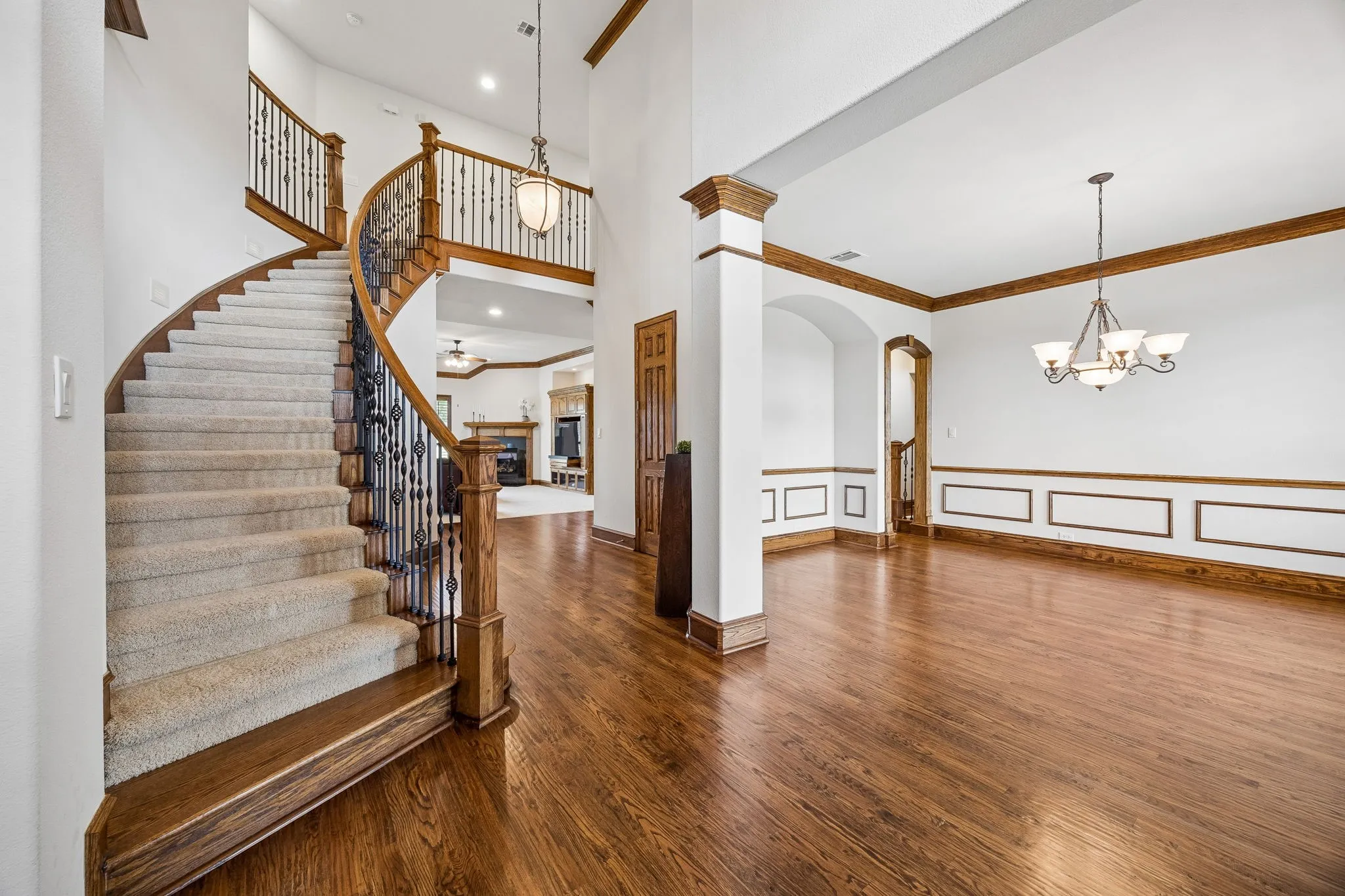 Entry and dining room with wood floors