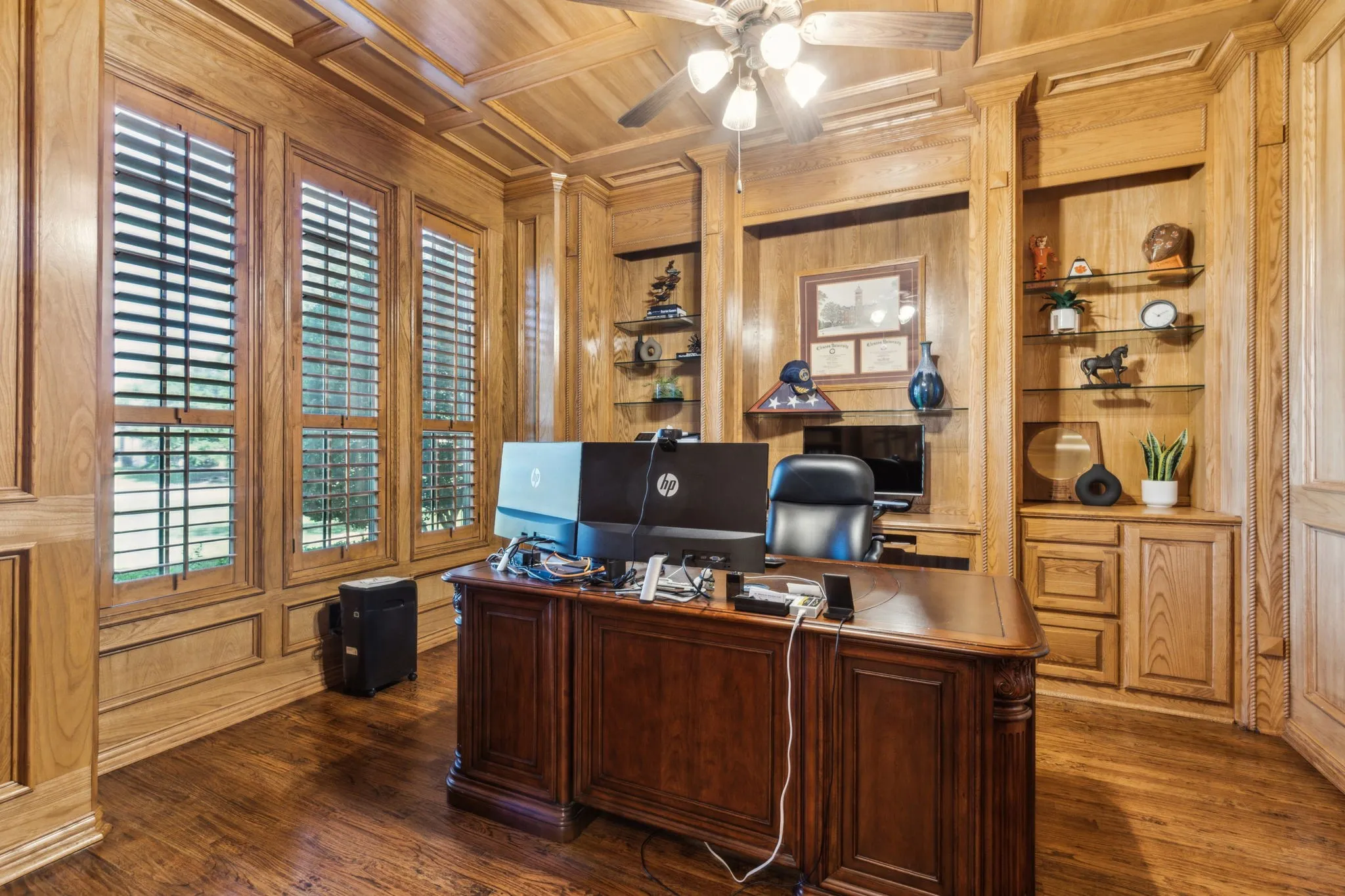 Executive office with beautiful wood throughout.