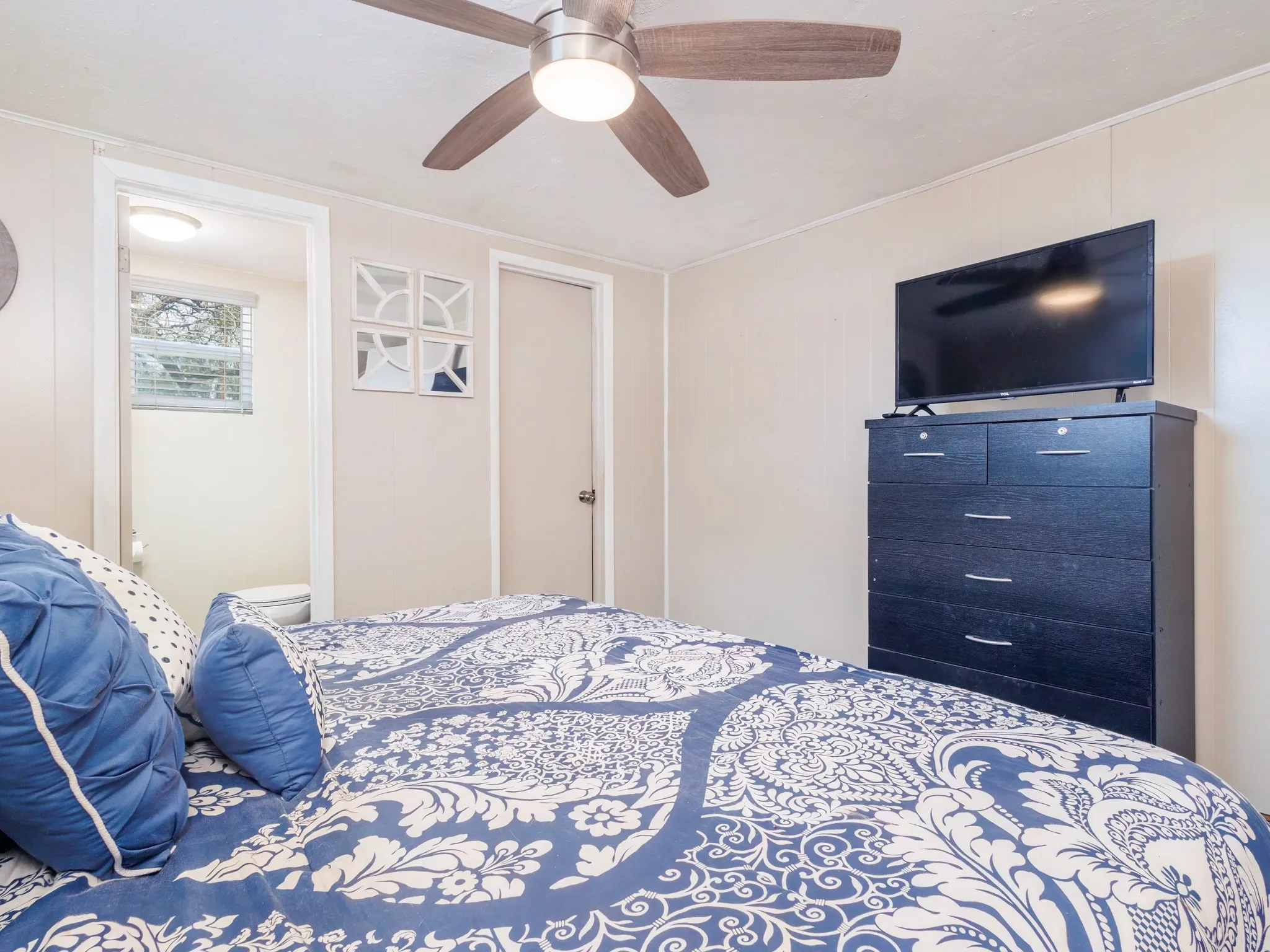 Bedroom featuring a ceiling fan