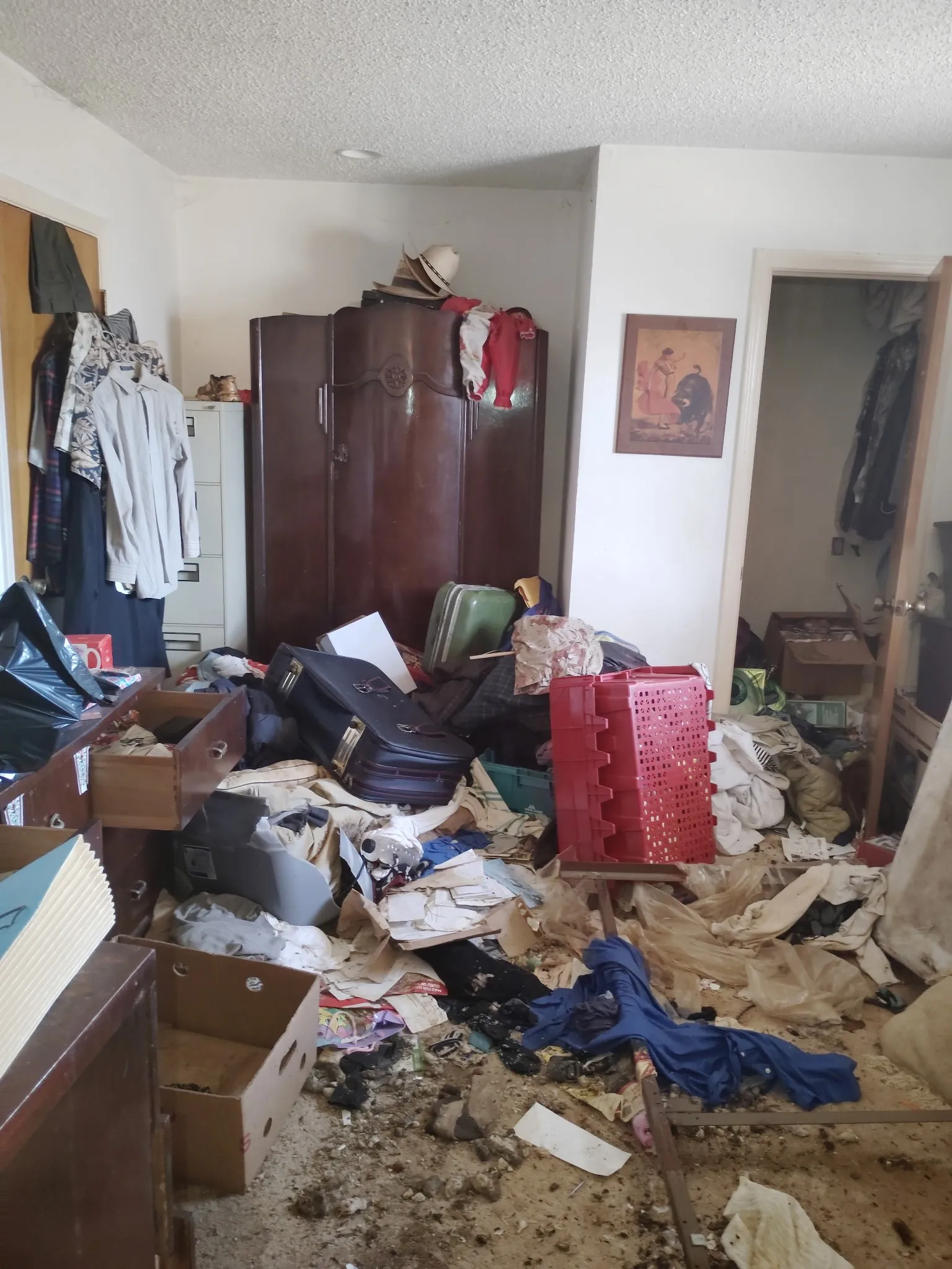 Miscellaneous room with a textured ceiling